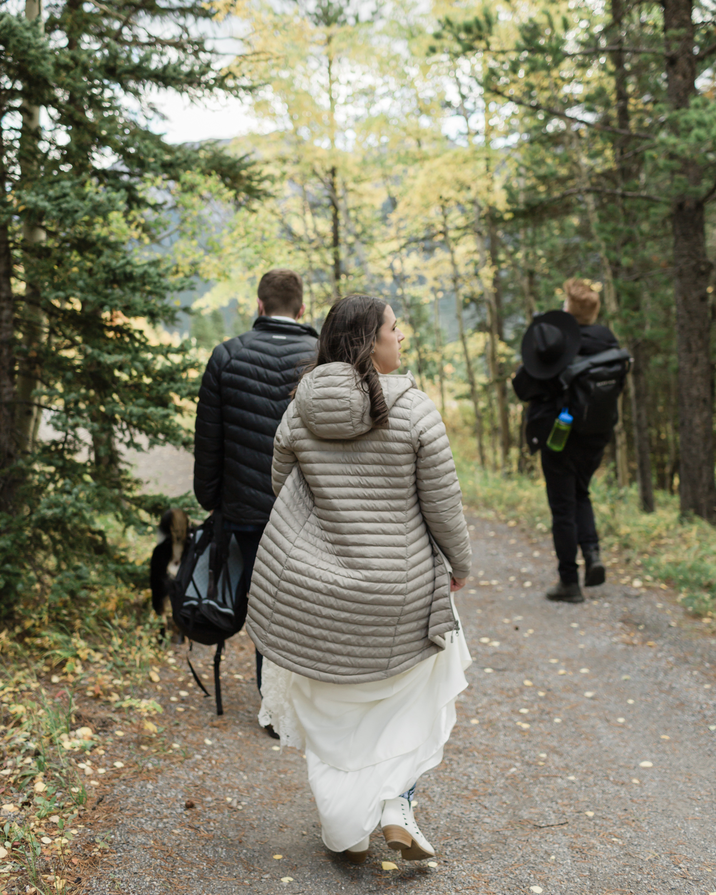 A couple walking during their Kananaskis Country ceremony