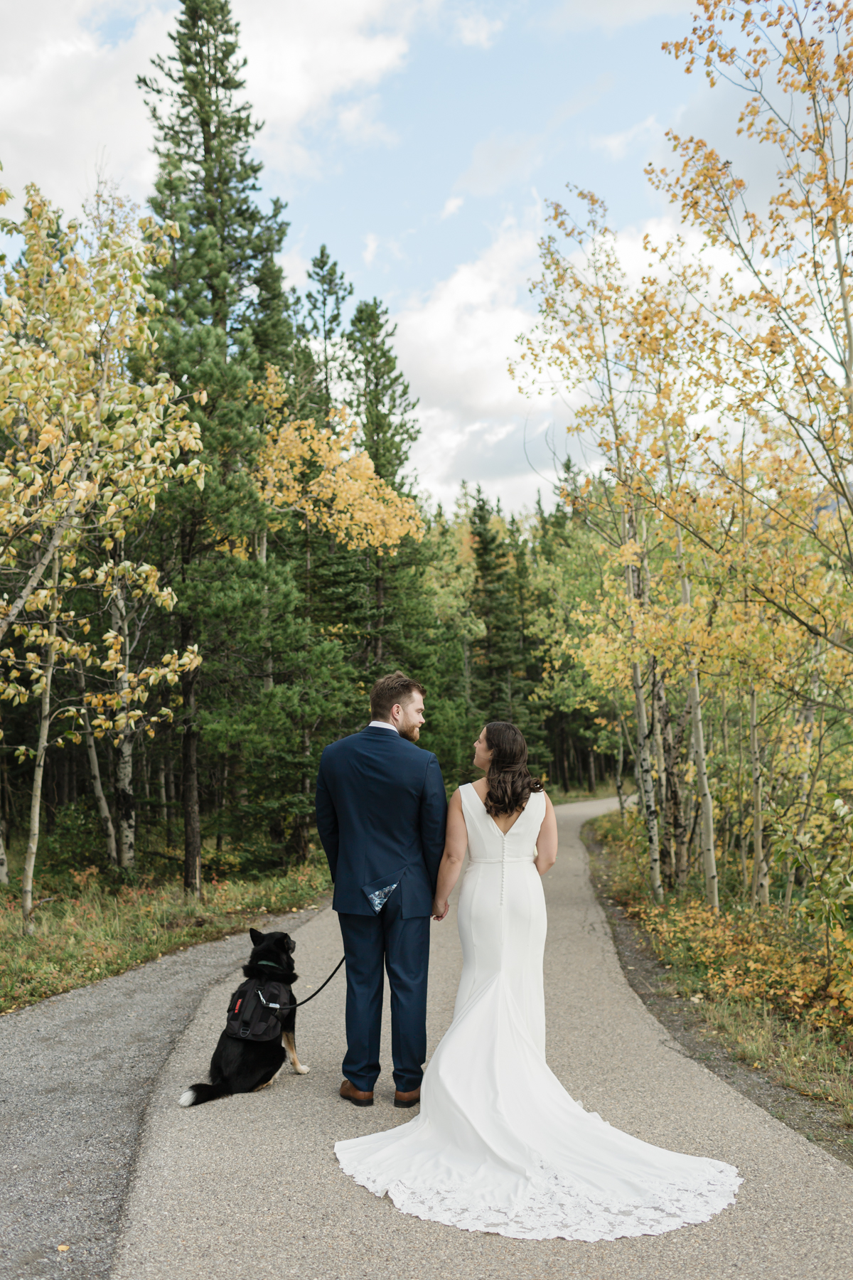 A couple walking during their Kananaskis Country ceremony