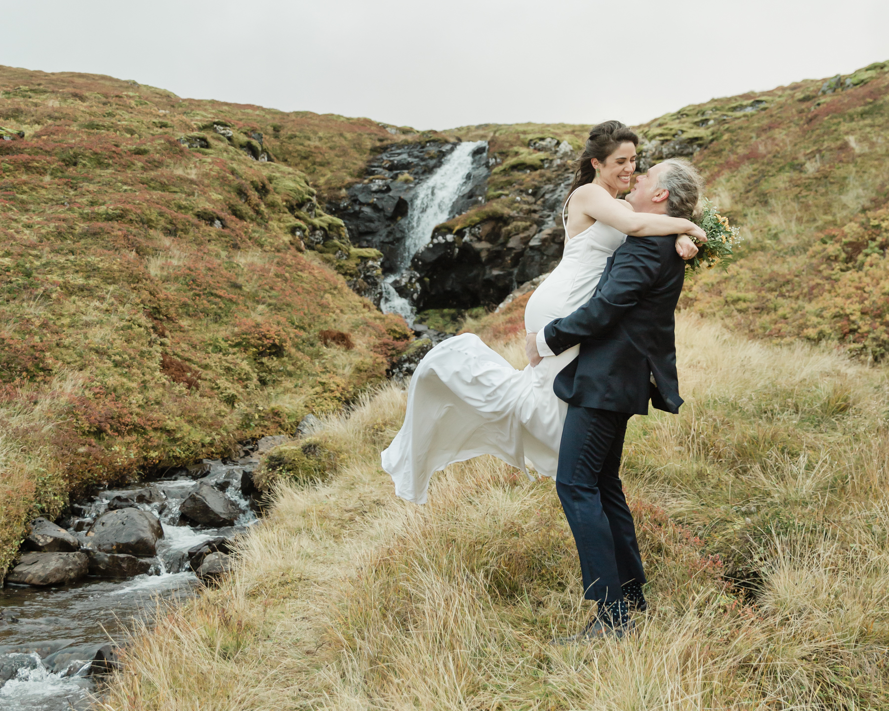 A couple posing for a photo during their Iceland wedding on the Snæfellsnes Peninsula 