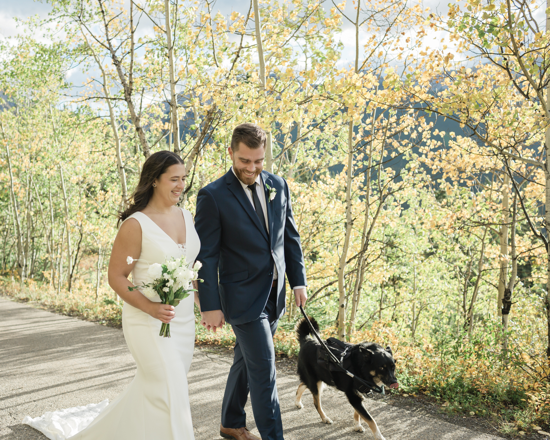 A couple walking during their elopement near Mount Kidd