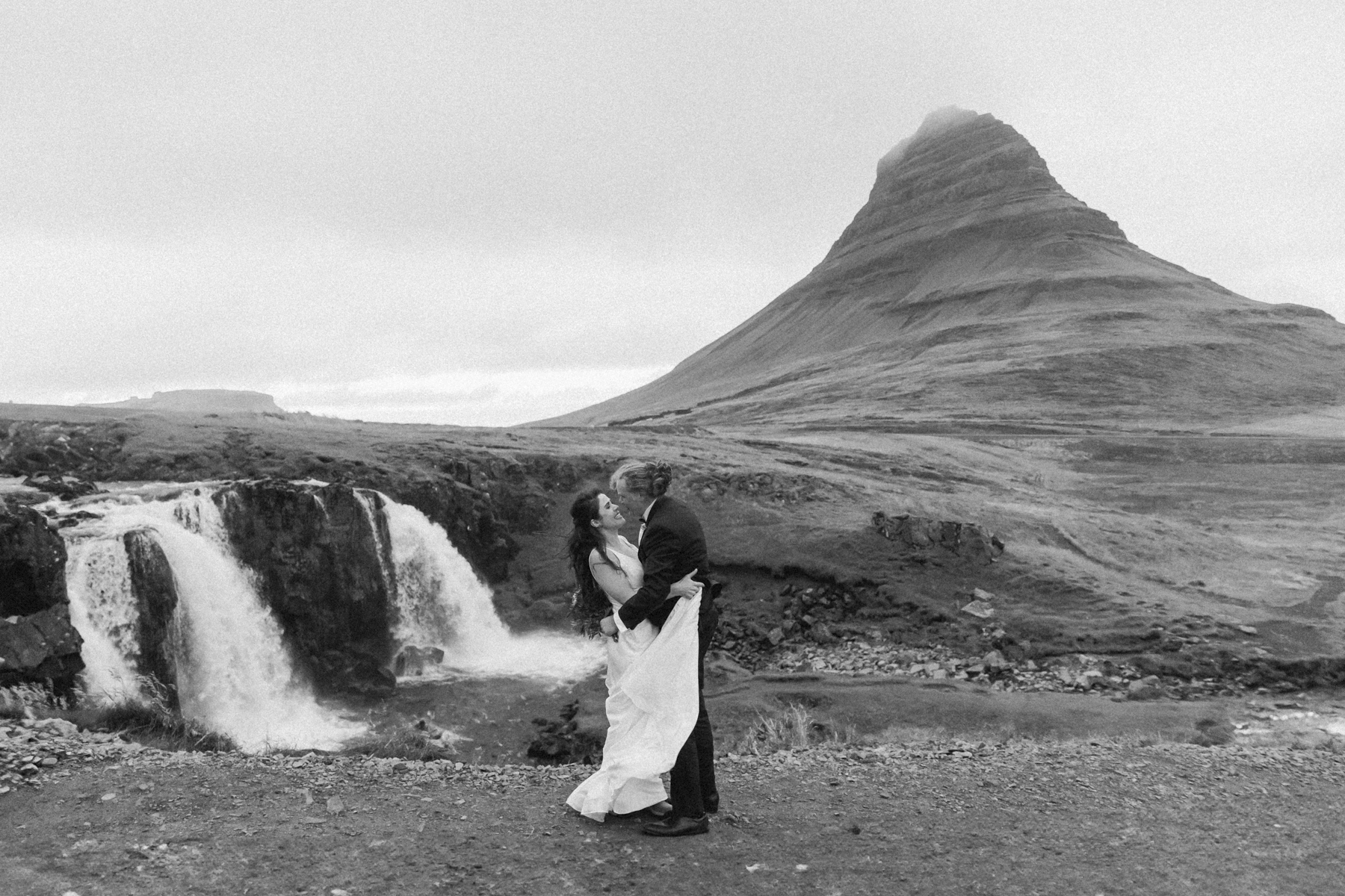 A couple posing for a photo during their Iceland wedding on the Snæfellsnes Peninsula 