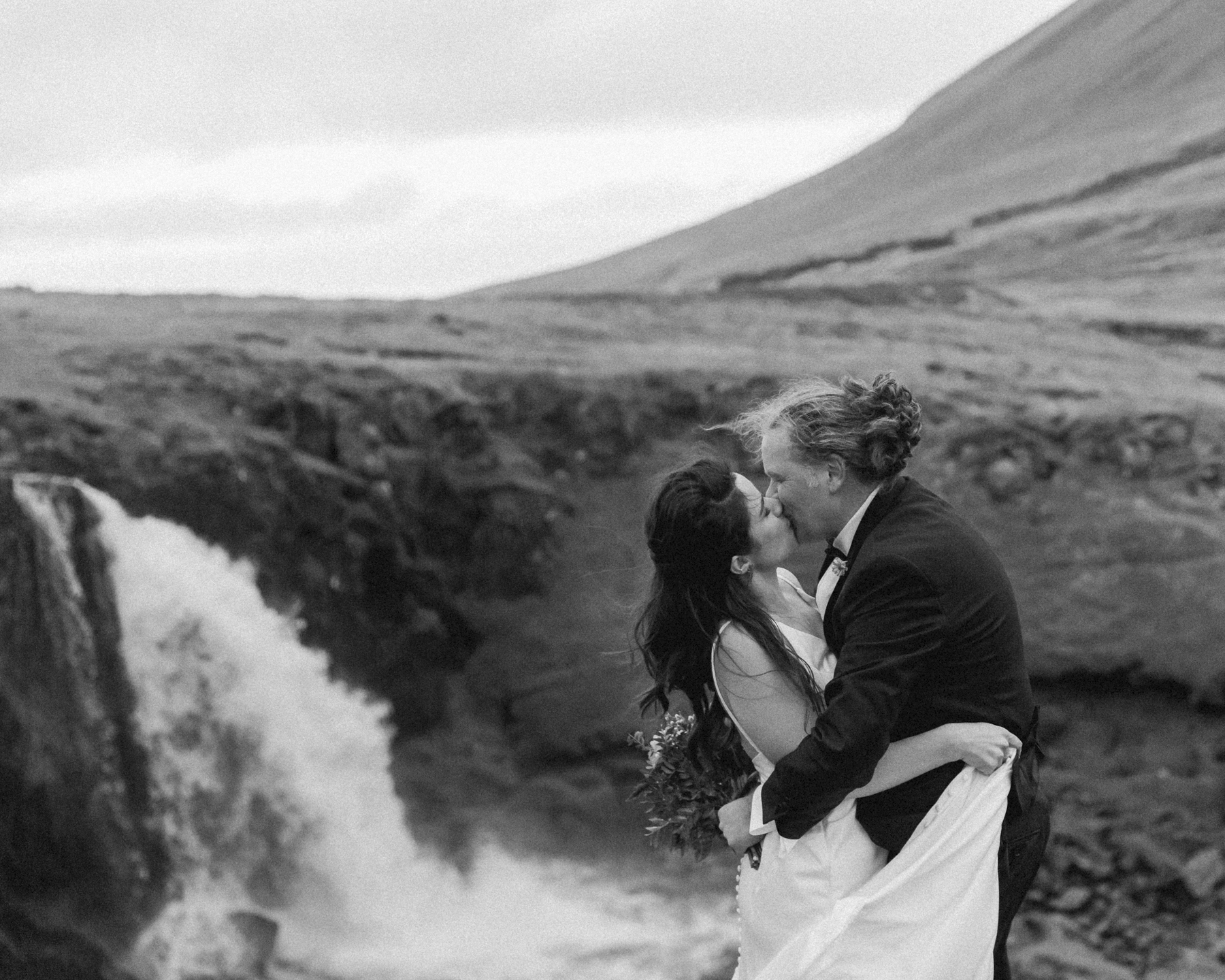 A couple posing for a photo during their Iceland wedding on the Snæfellsnes Peninsula 