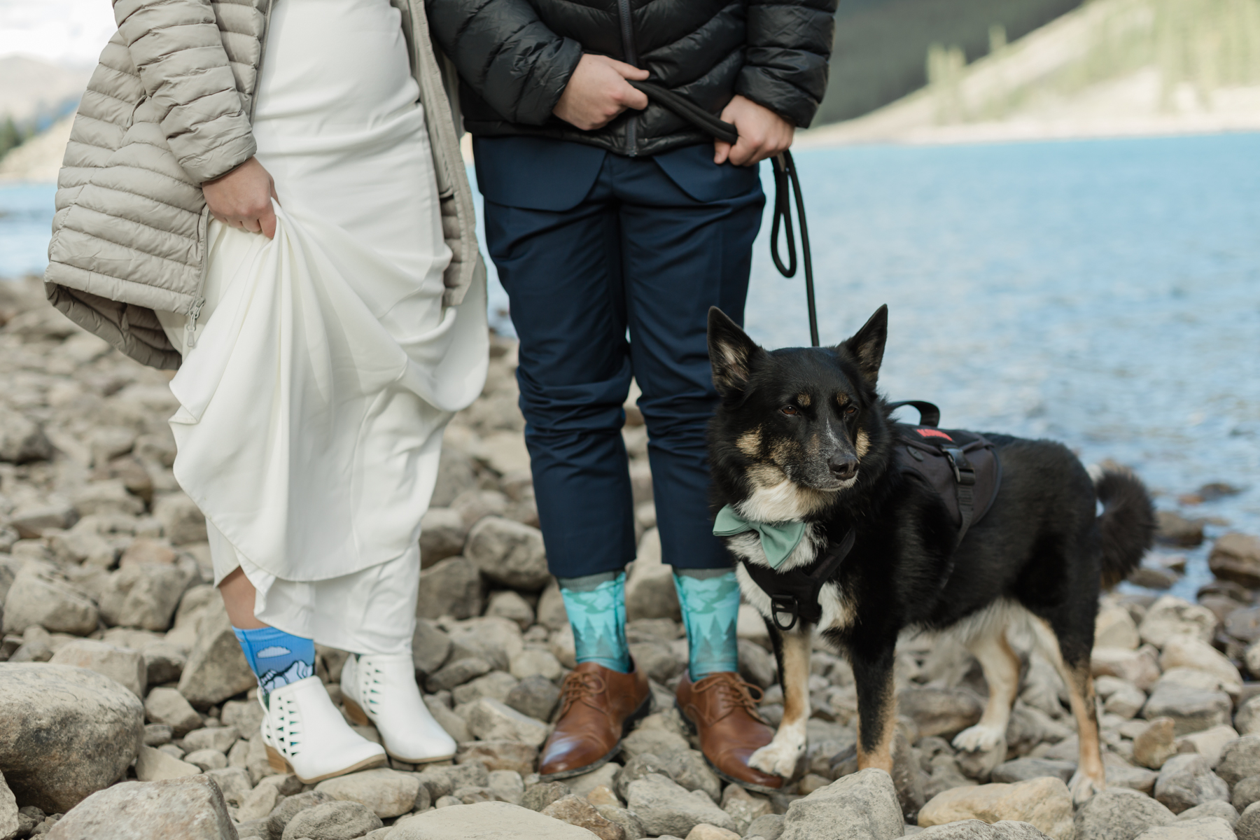 A couple walking around Moraine Lake during their elopement 