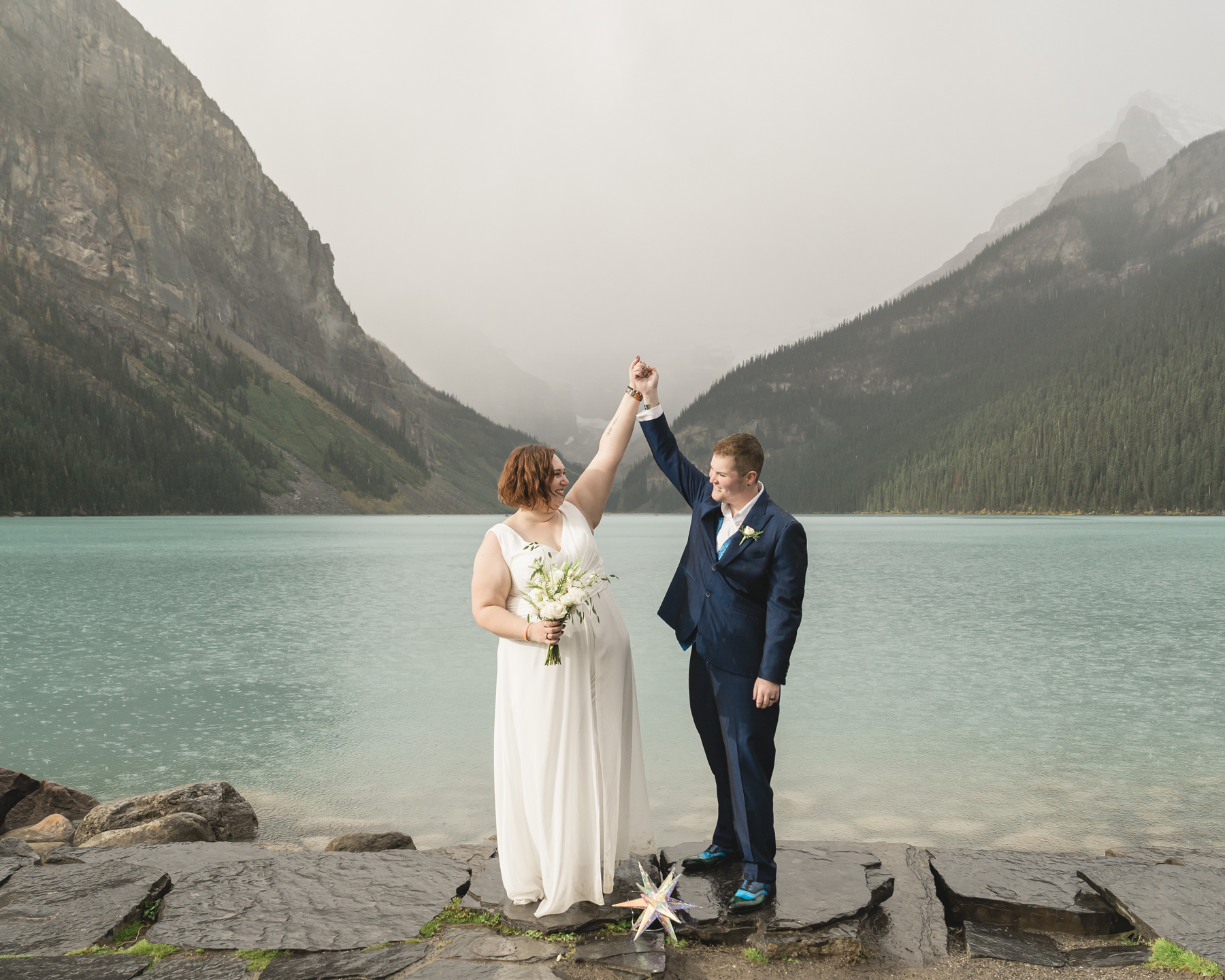 A LGBTQIA+ couple that is getting married  at Lake Louise in Banff 