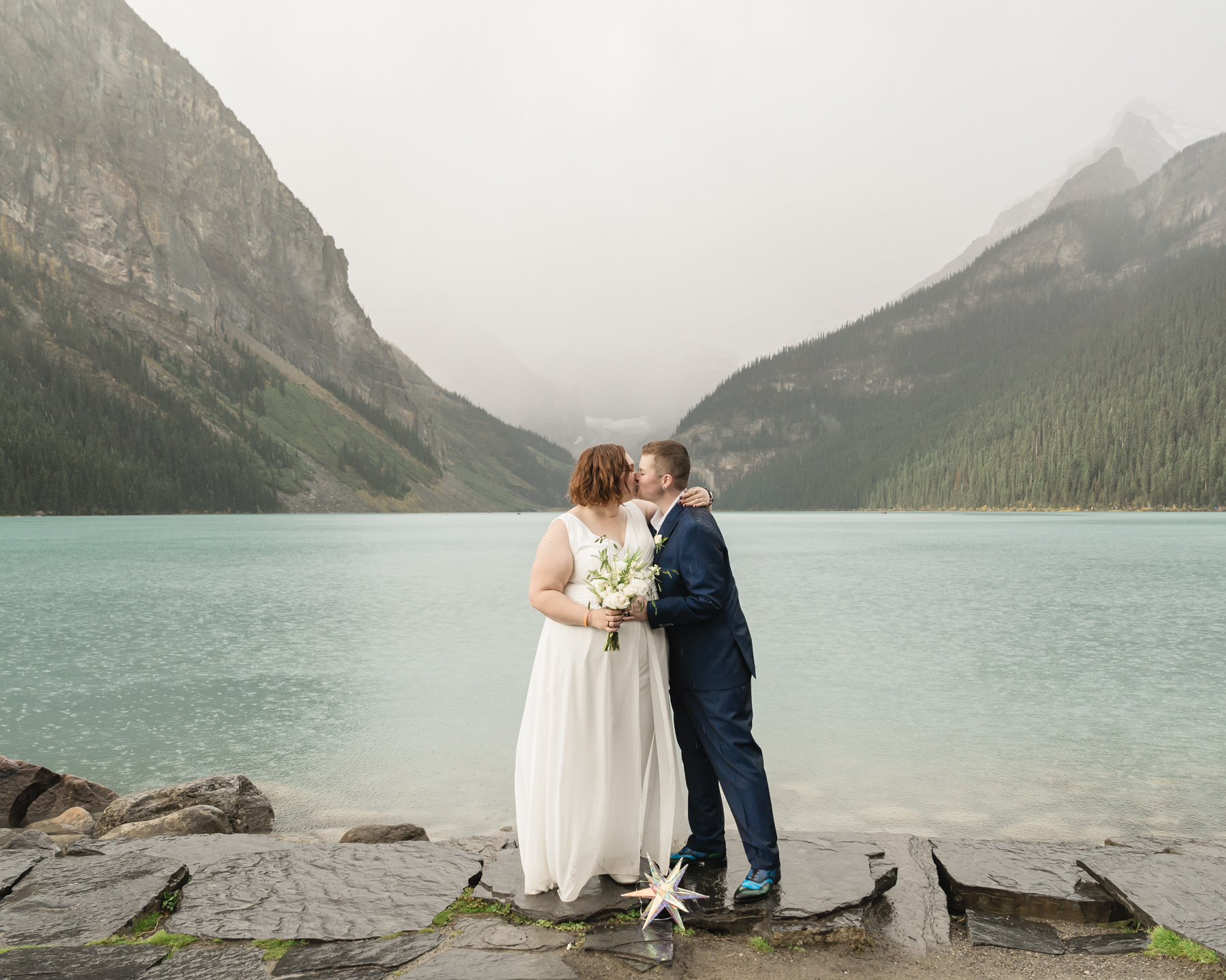 A LGBTQIA+ couple that is getting married  at Lake Louise in Banff 