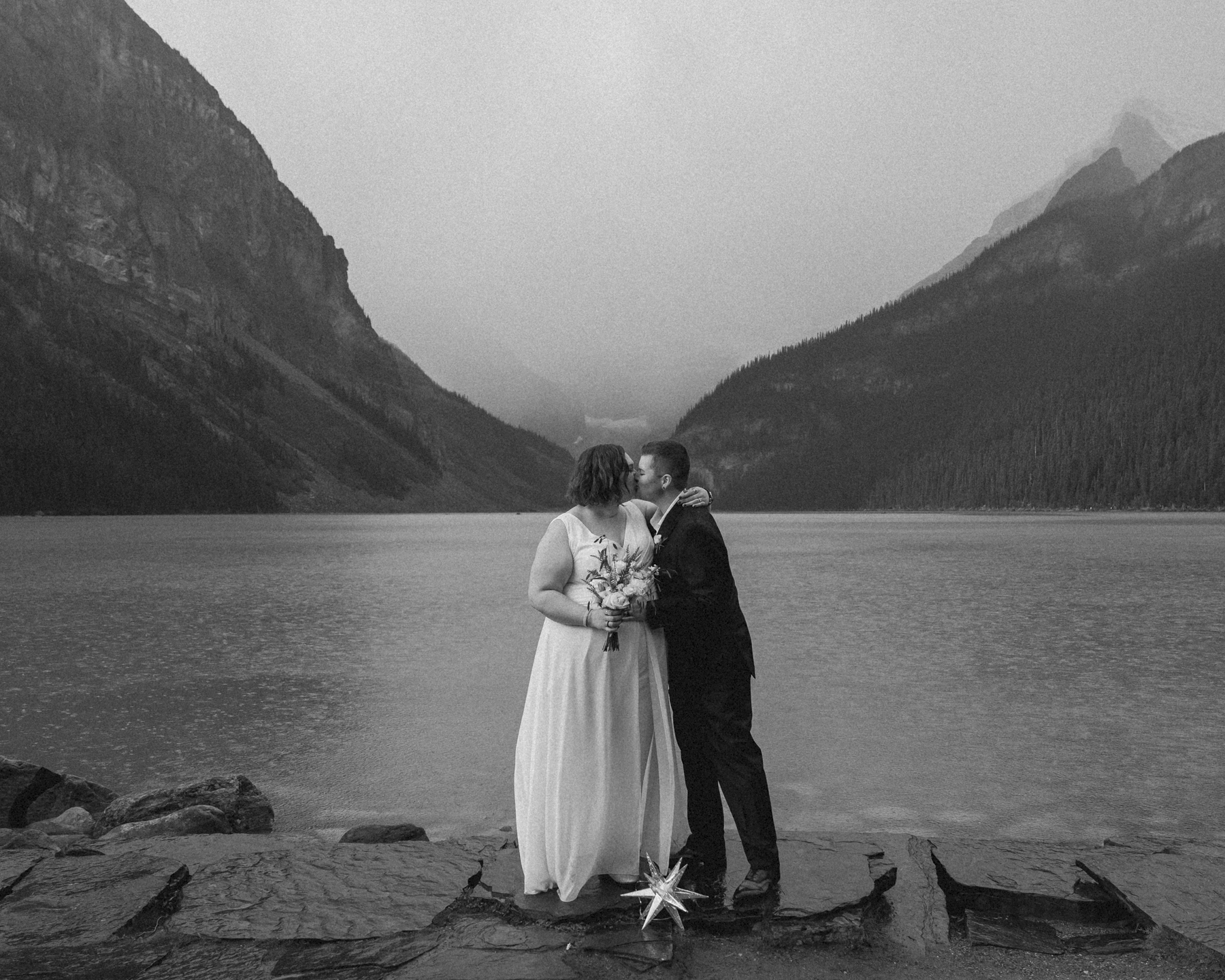 A LGBTQIA+ couple that is getting married  at Lake Louise in Banff 