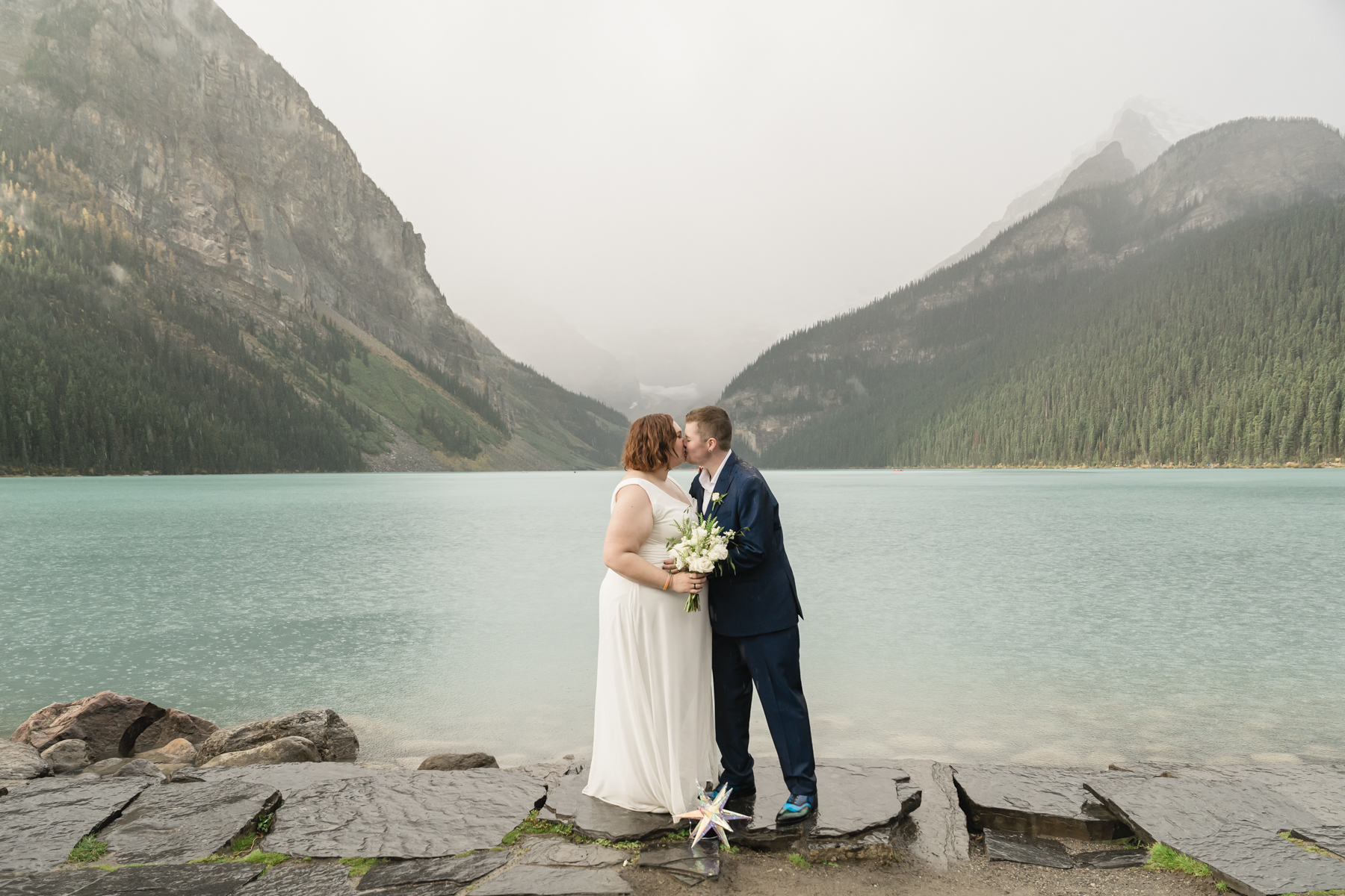 An LGBTQIA+ couple that just got married at Lake Louise