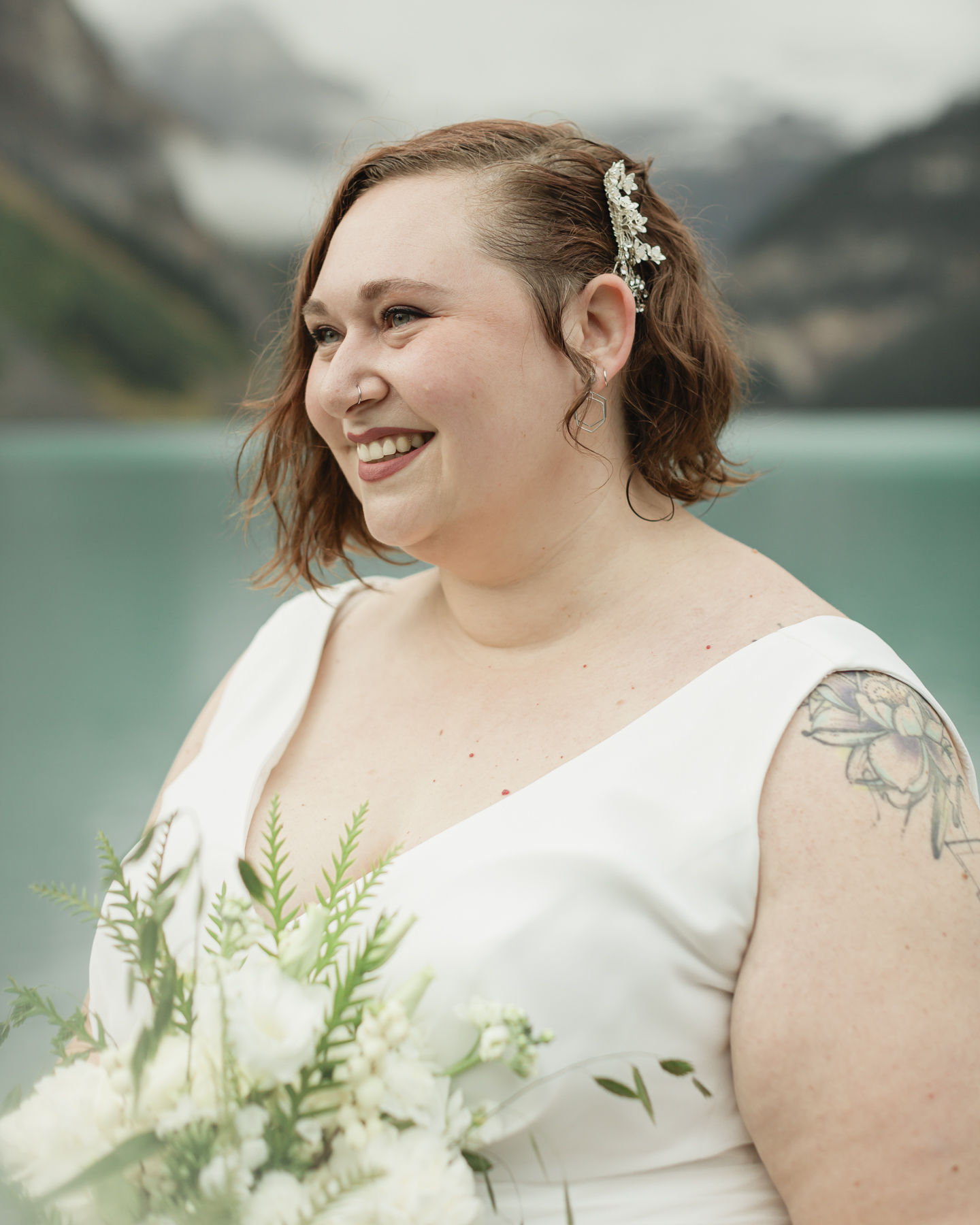 A portrait of a queer bride that just got married at Lake Louise