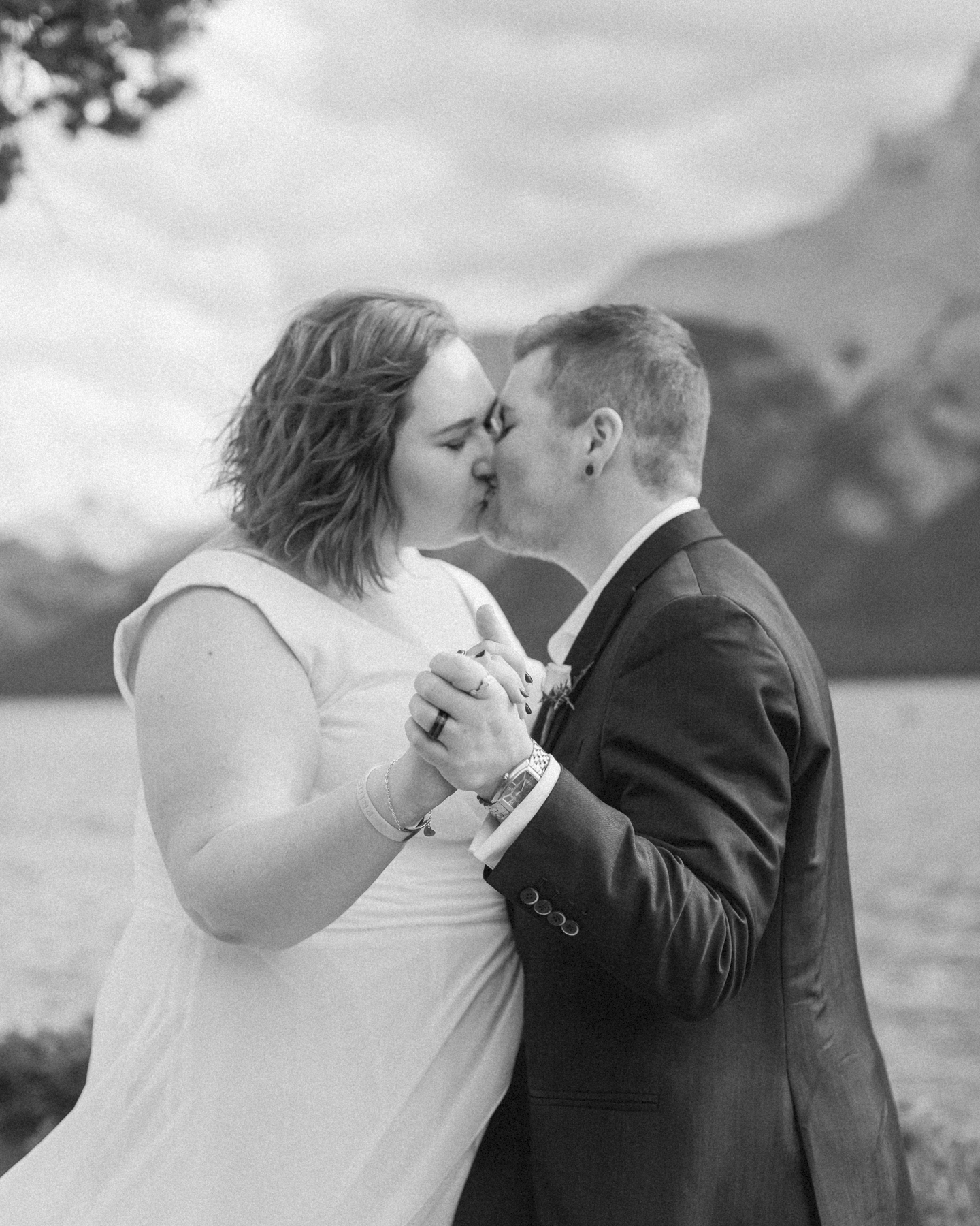 A LGBTQIA+ having their first dance after their elopement at Lake Minnewanka 