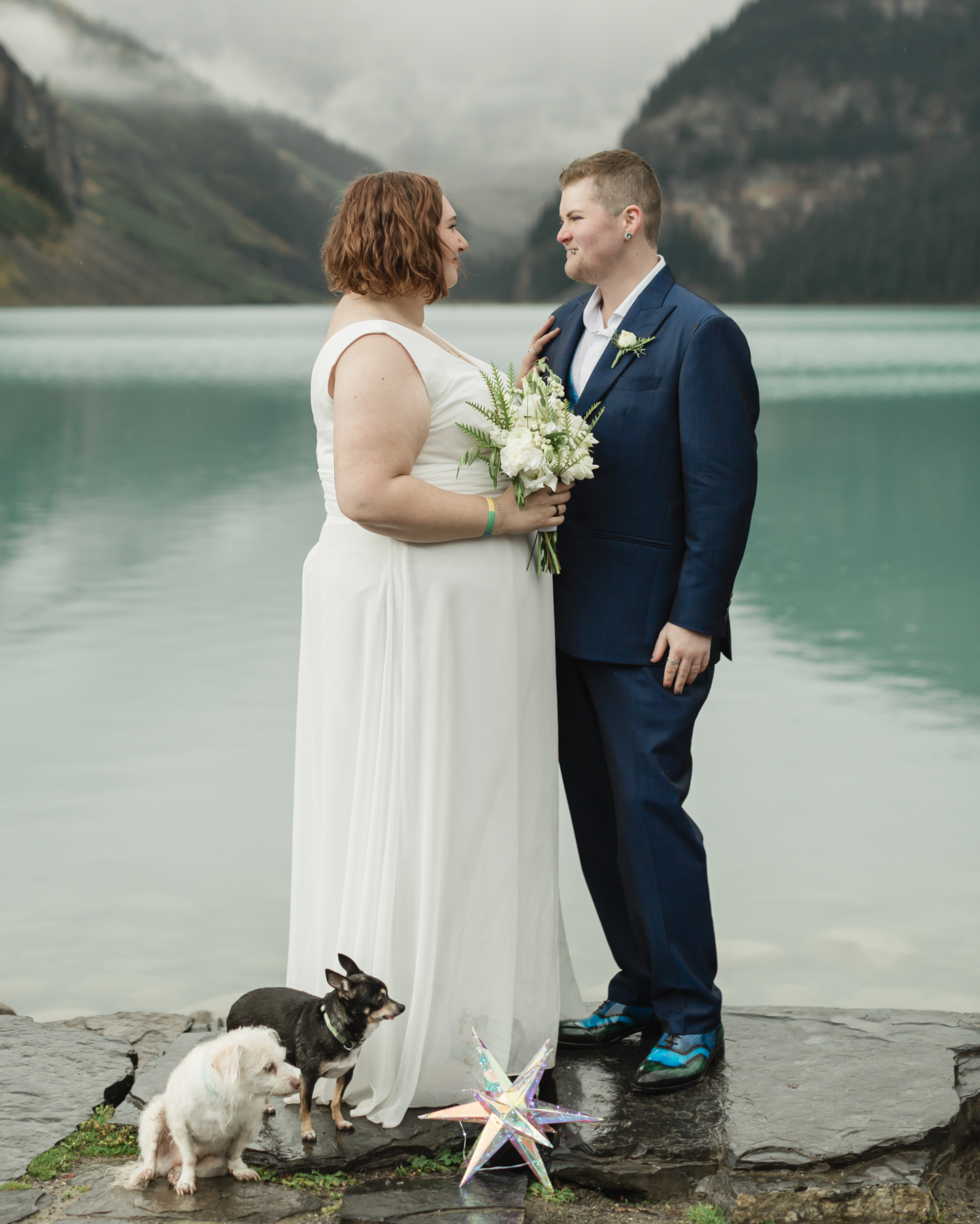 A queer couple that is getting married  at Lake Louise in Banff 