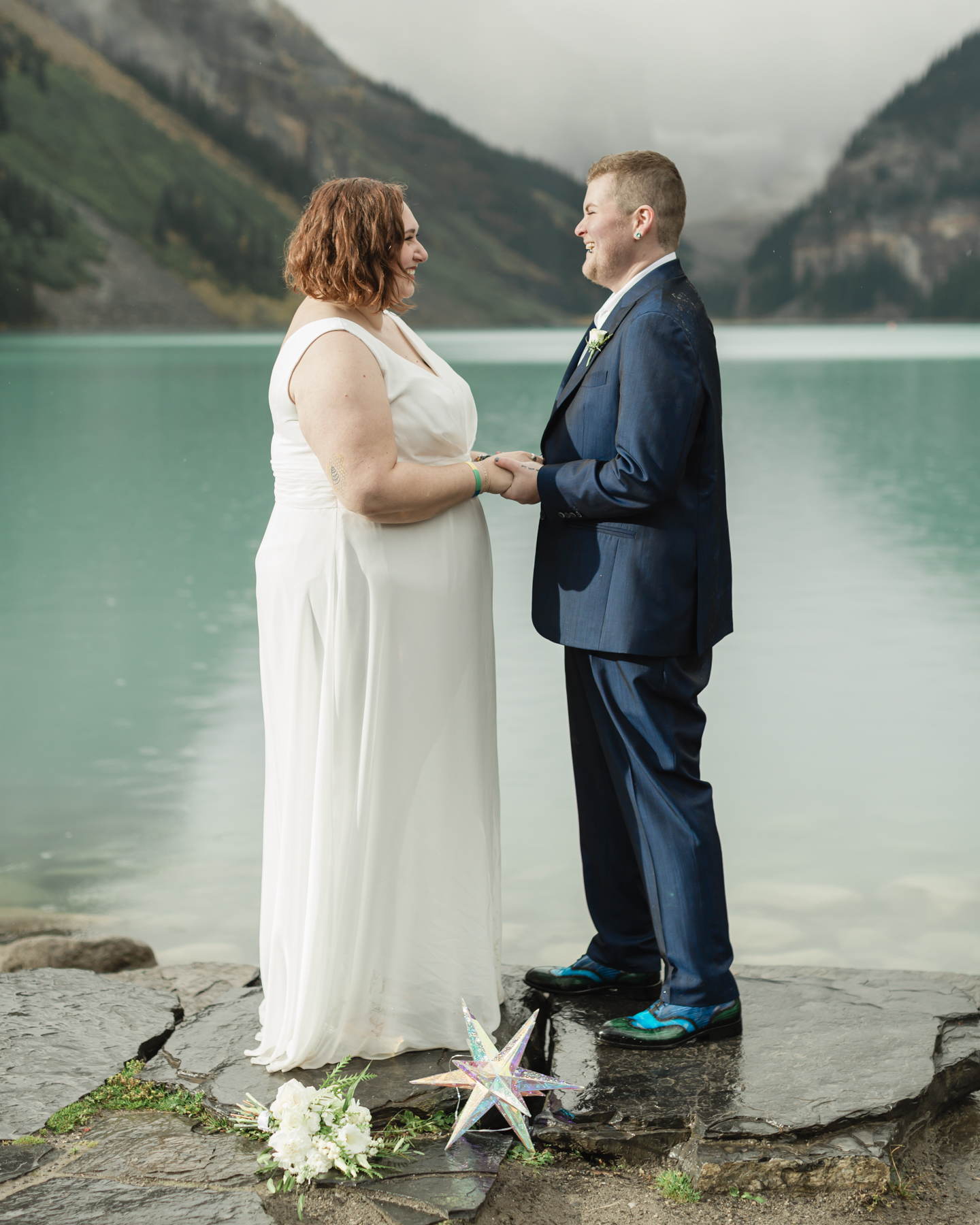 A queer couple that is getting married  at Lake Louise in Banff 