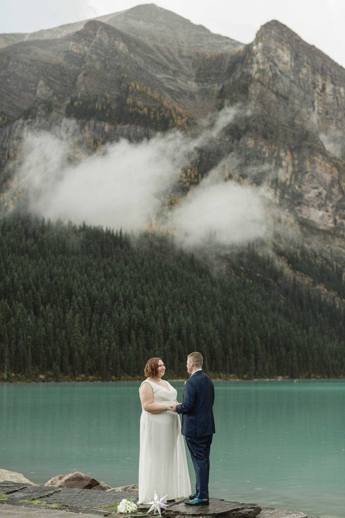 A queer couple that is getting married  at Lake Louise in Banff 