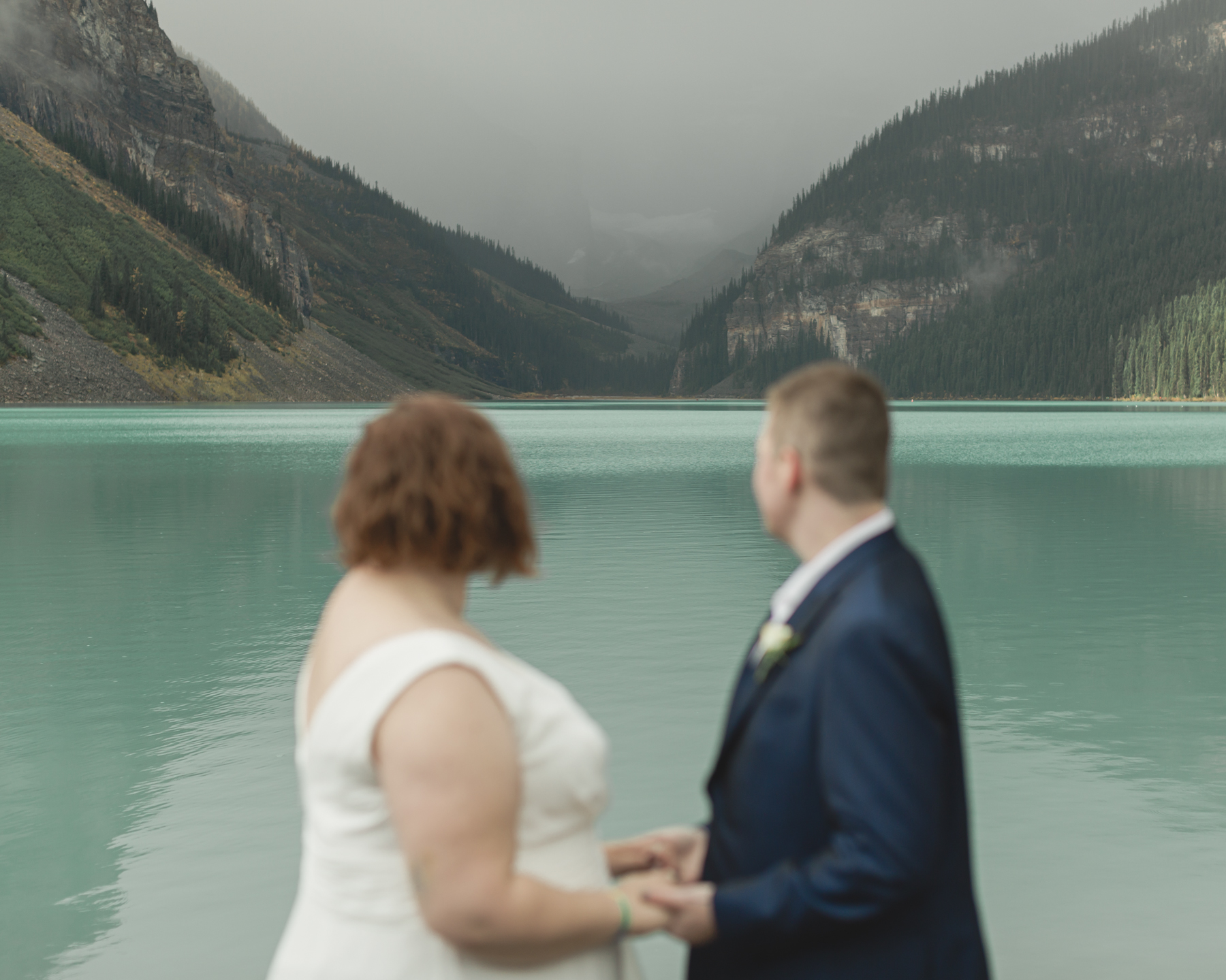 A queer couple that is getting married  at Lake Louise in Banff 