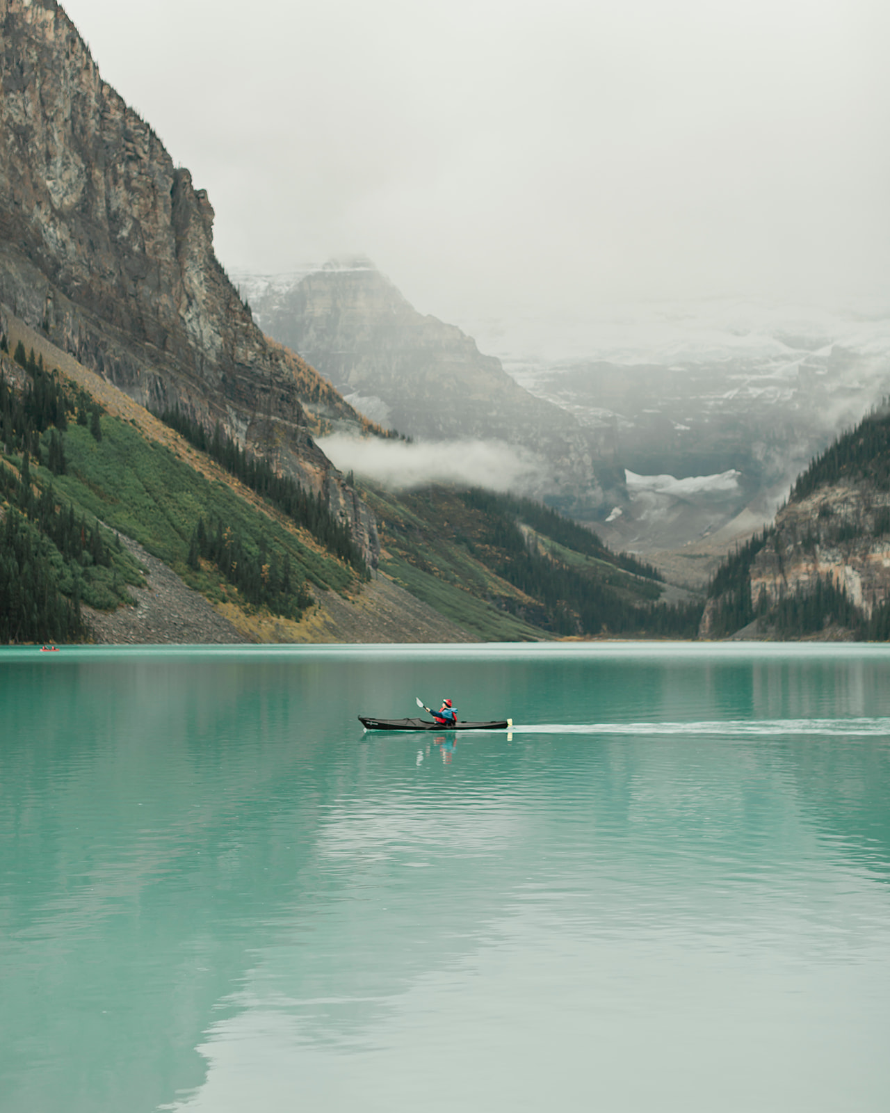 A kayaker captured during a Lake Louise elopement