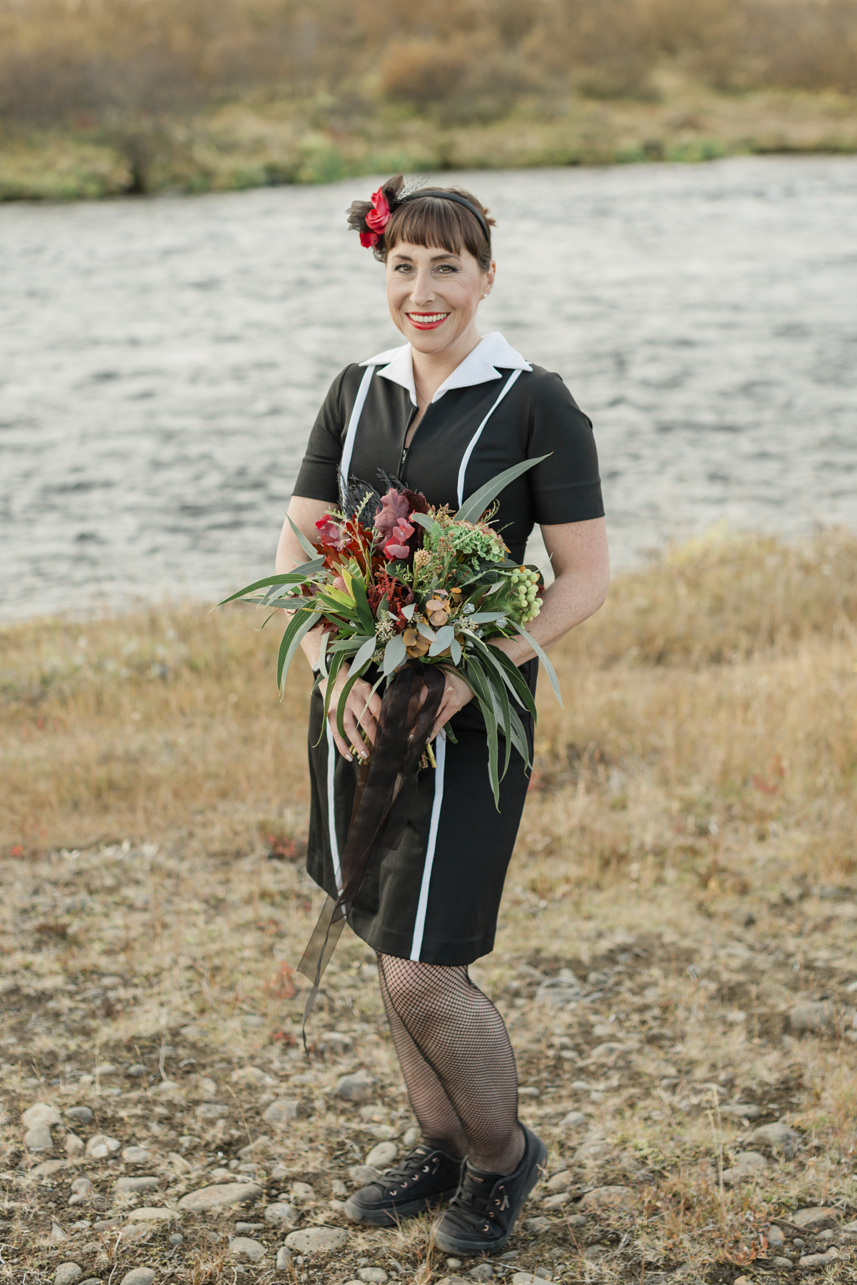 Bridal portraits showcasing her accessories and wedding bouquet for her Iceland elopement 