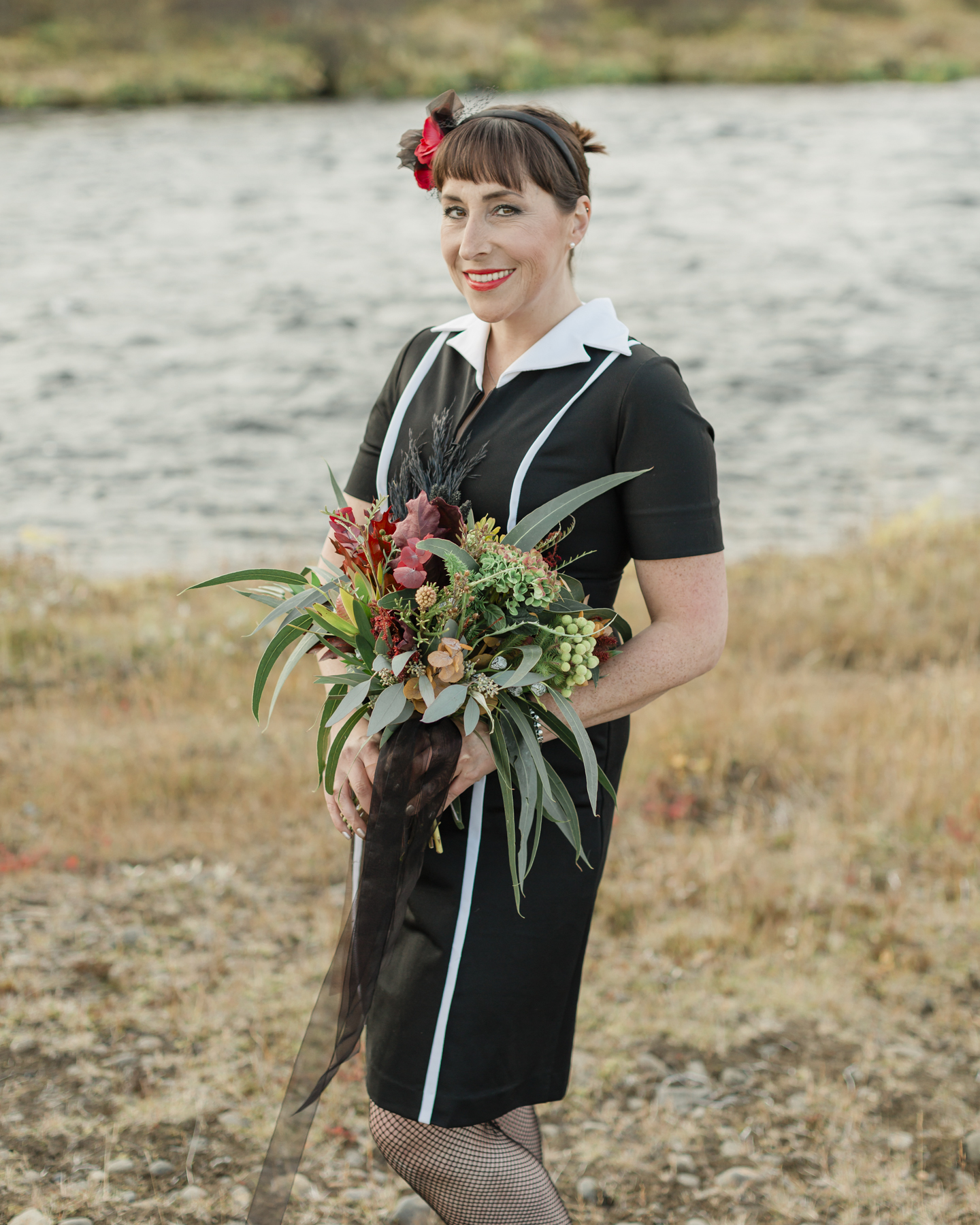 Bridal portraits showcasing her accessories and wedding bouquet for her Iceland elopement 