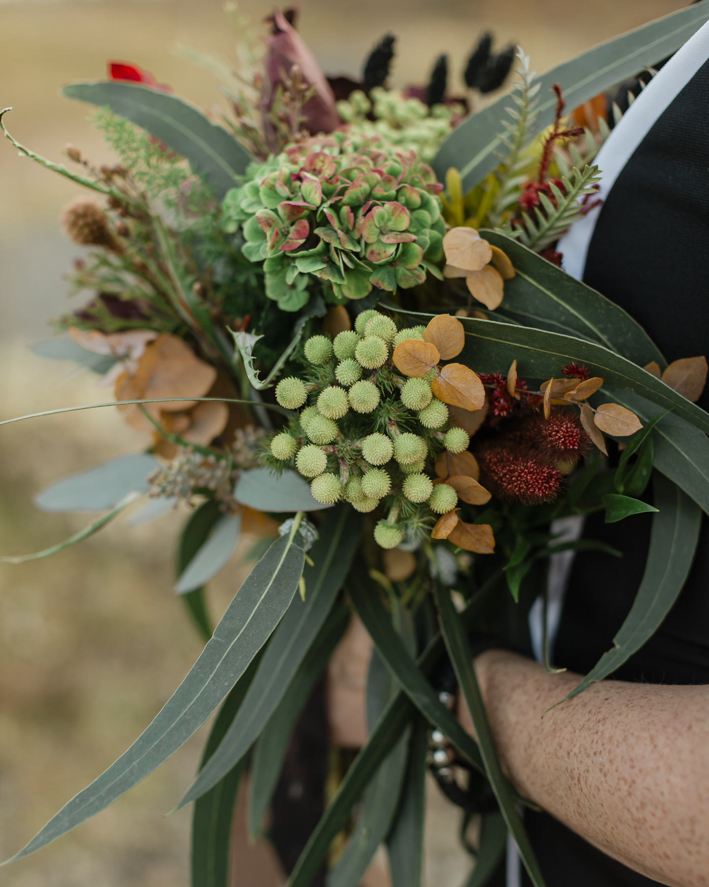 Bridal portrait close ups of her wedding bouquet for her Iceland elopement 