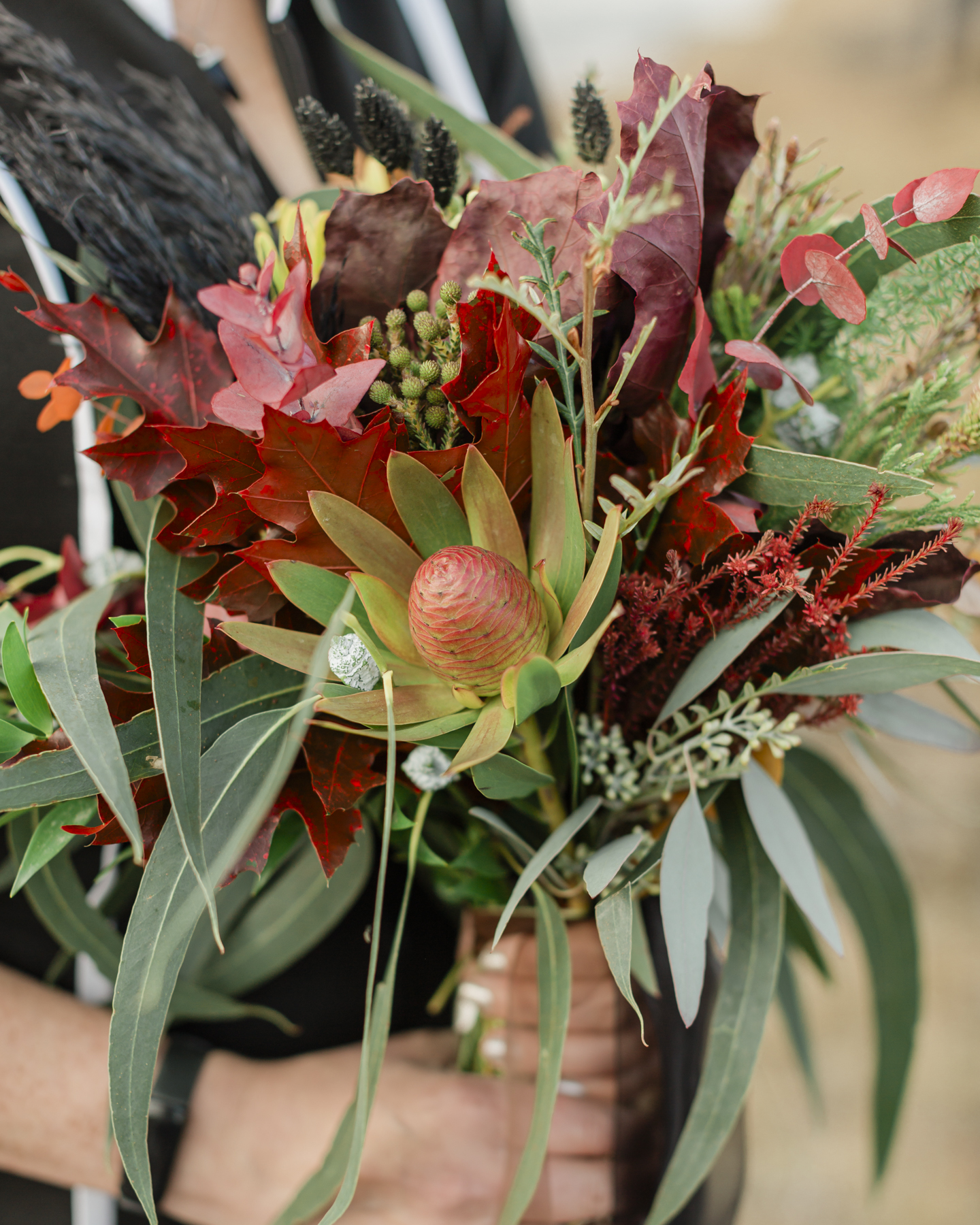 Bridal portrait close ups of her wedding bouquet for her Iceland elopement 