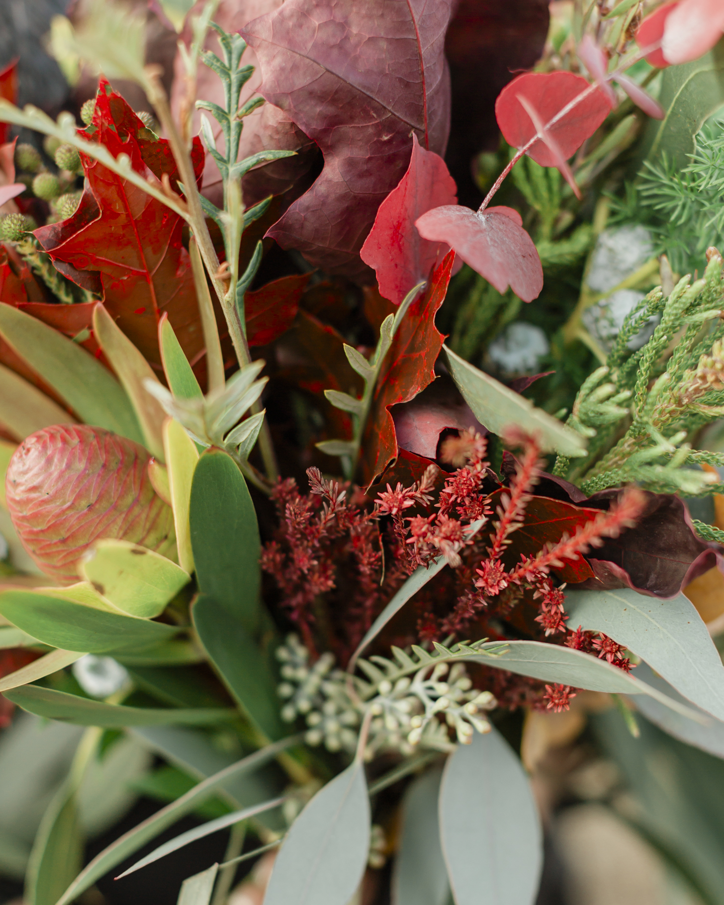 Bridal portrait close ups of her wedding bouquet for her Iceland elopement 
