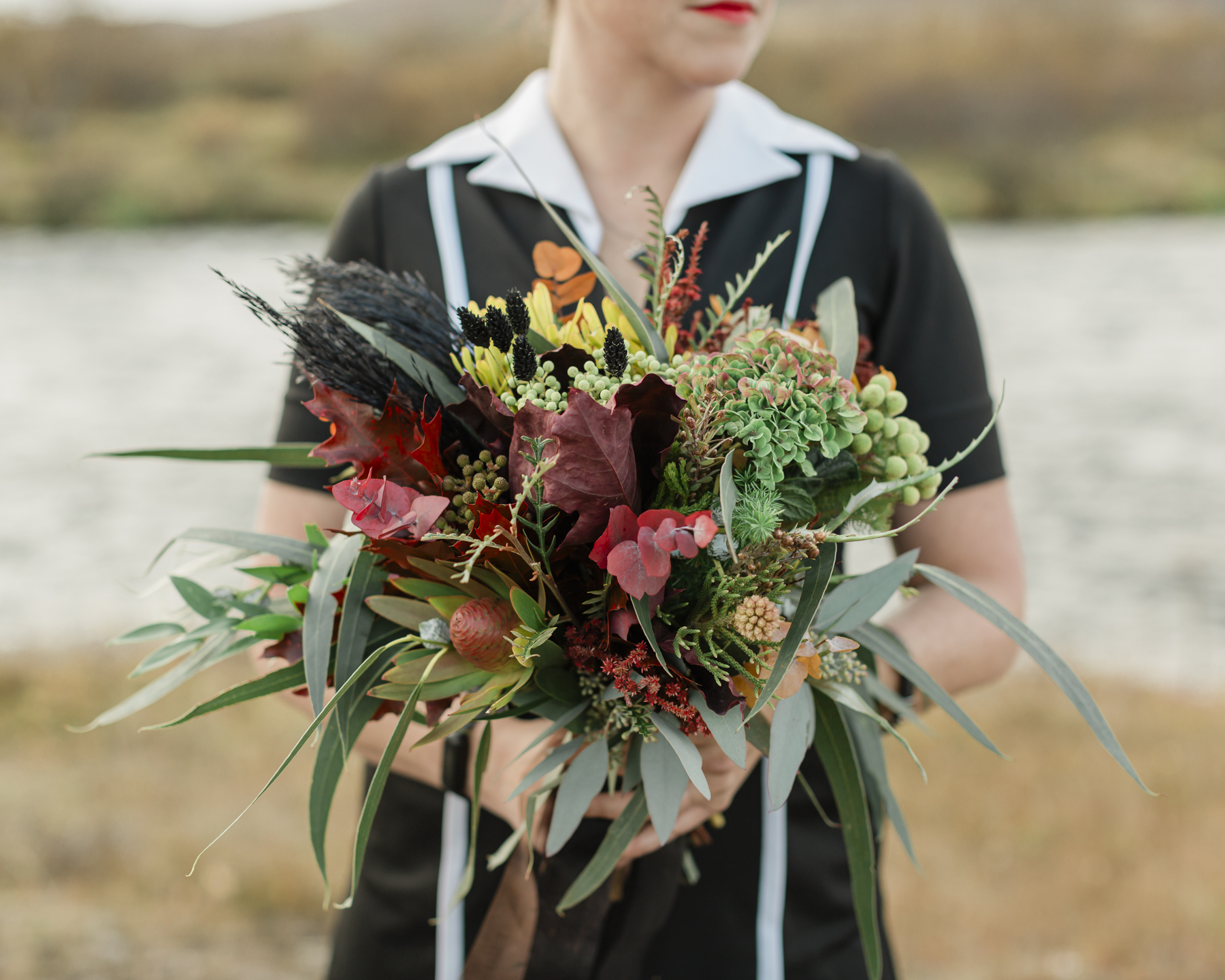 Bridal portrait close ups of her wedding bouquet for her Iceland elopement 