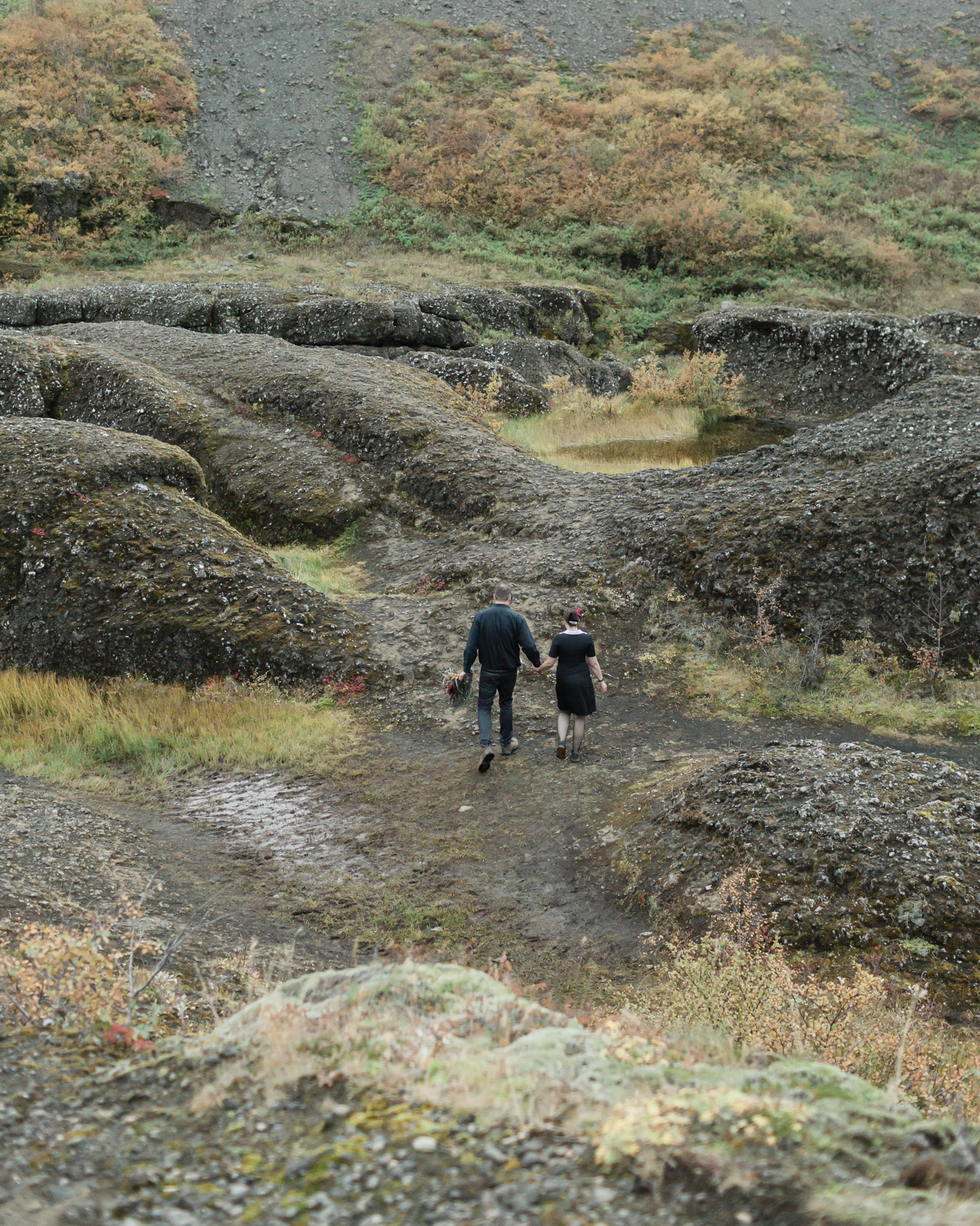 Virginia and Derek having their first dance in an Iceland canyon after their elopement ceremony