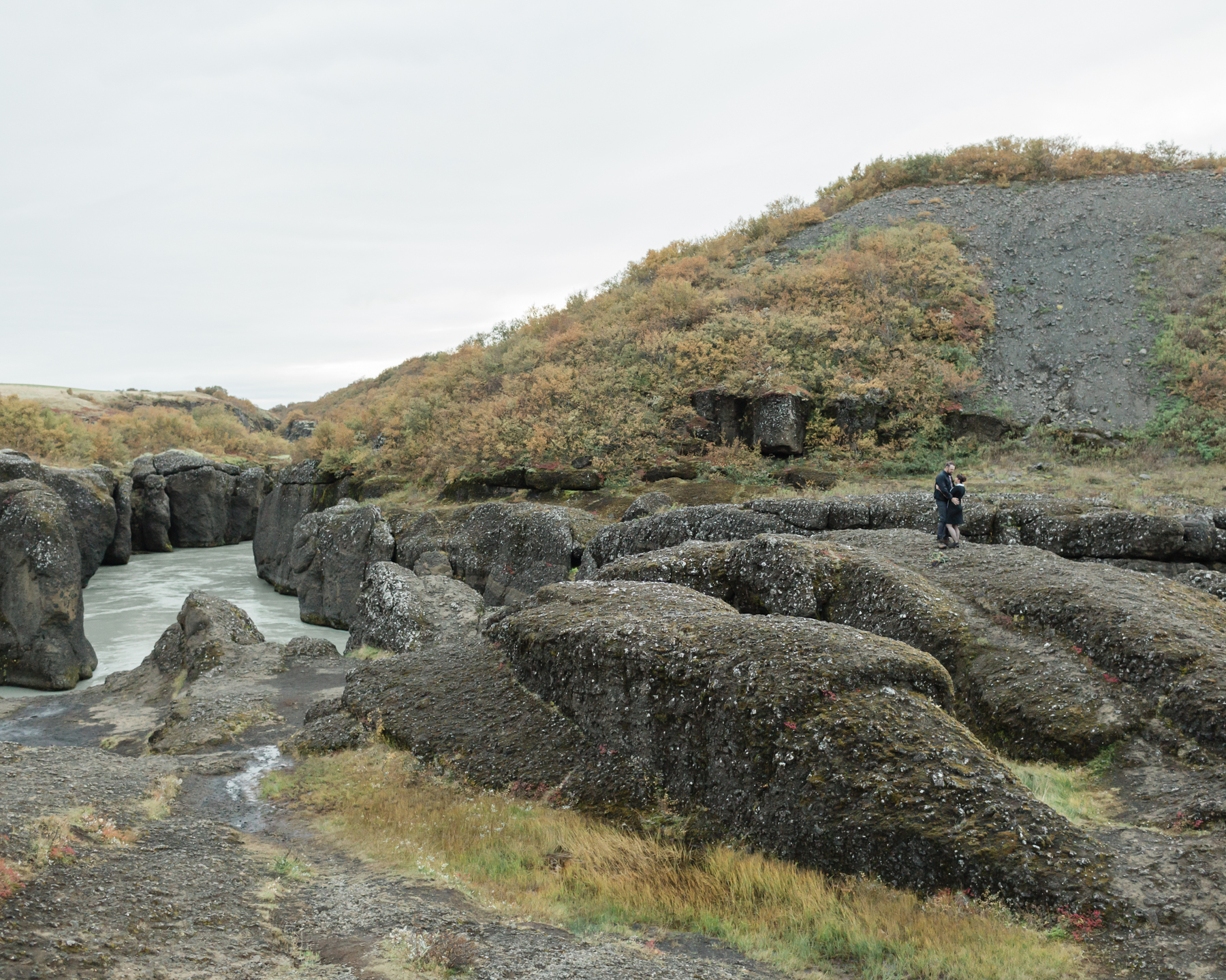 A couple that are having their first dance in a canyon along the golden circle after their wedding ceremony in Iceland