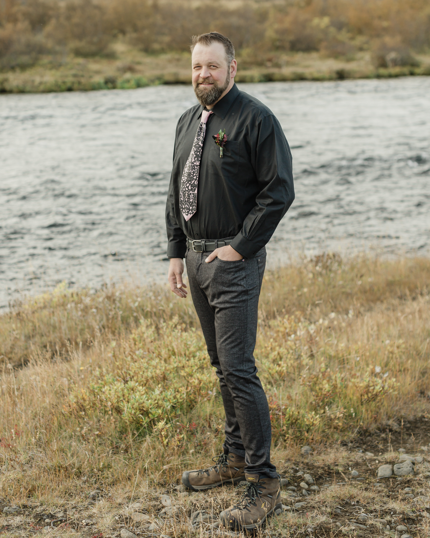 Groom portraits showcasing his accessories for his Iceland elopement 