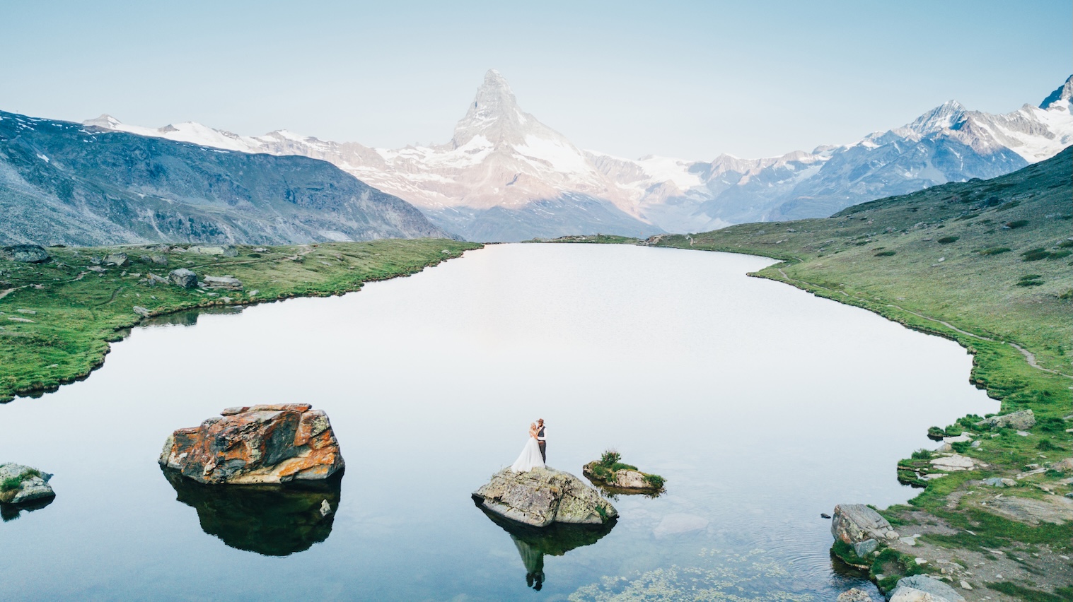 Couple getting married under the Matterhorn mountains in Switzerland