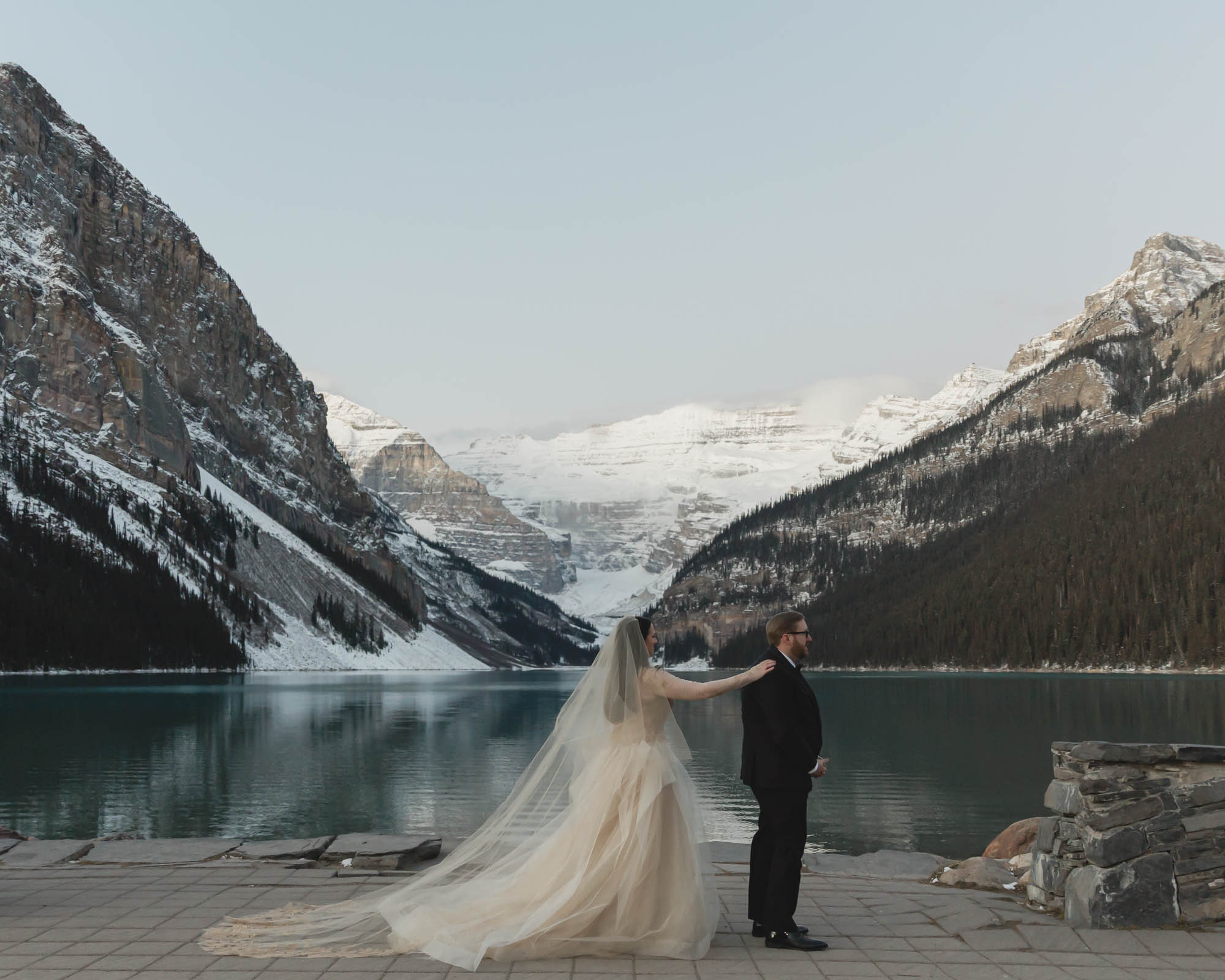 Lake Louise Elopement in Banff National Park, the couple is about to have their first look.