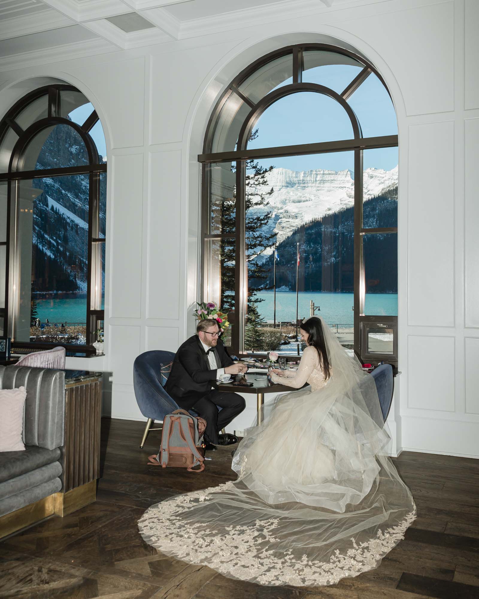 Wedding portraits at brunch in the Fairview Bar and Restaurant at the Chateau Lake Louise