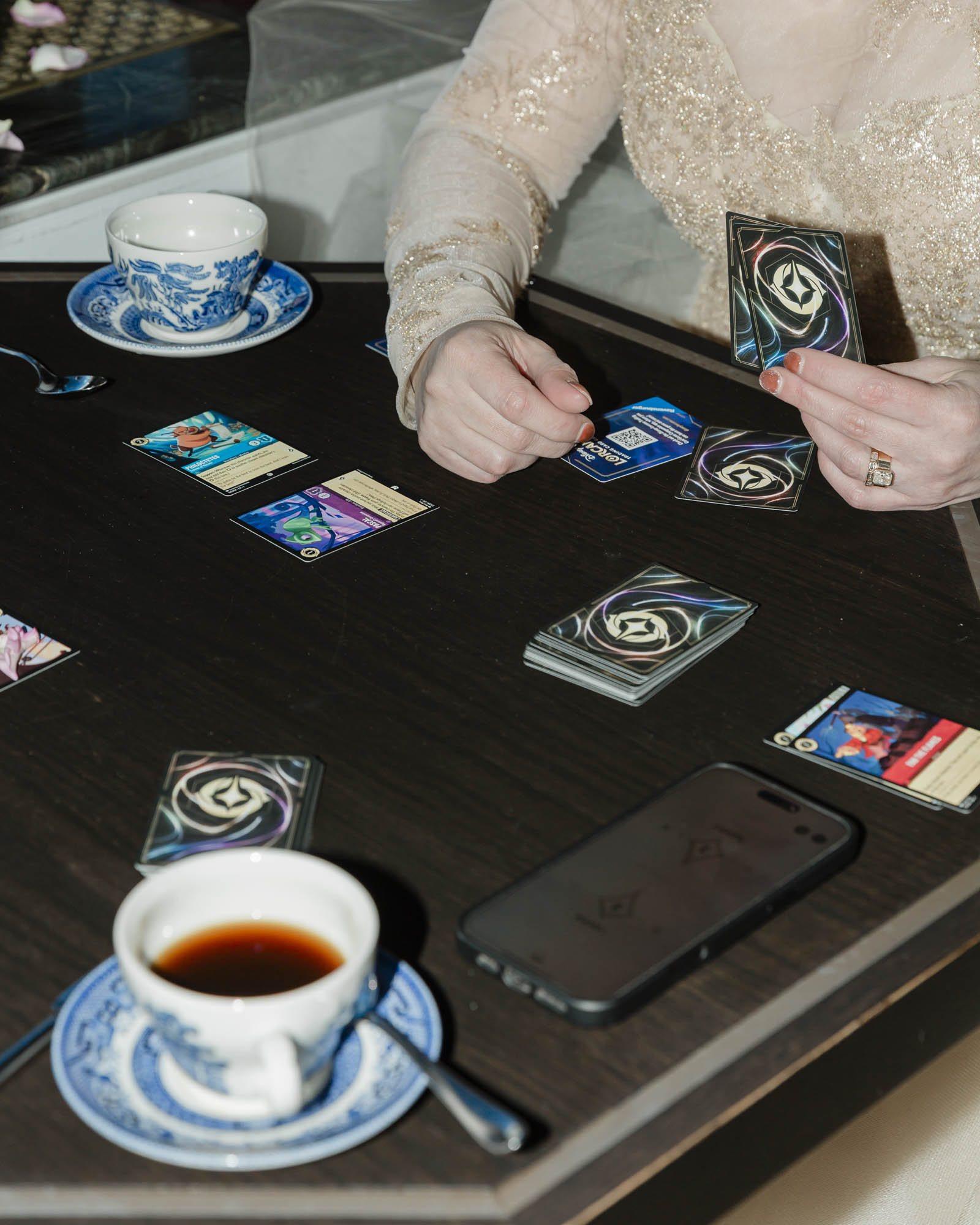 Playing Lorcana card game at brunch in the Fairview Bar and Restaurant at the Chateau Lake Louise