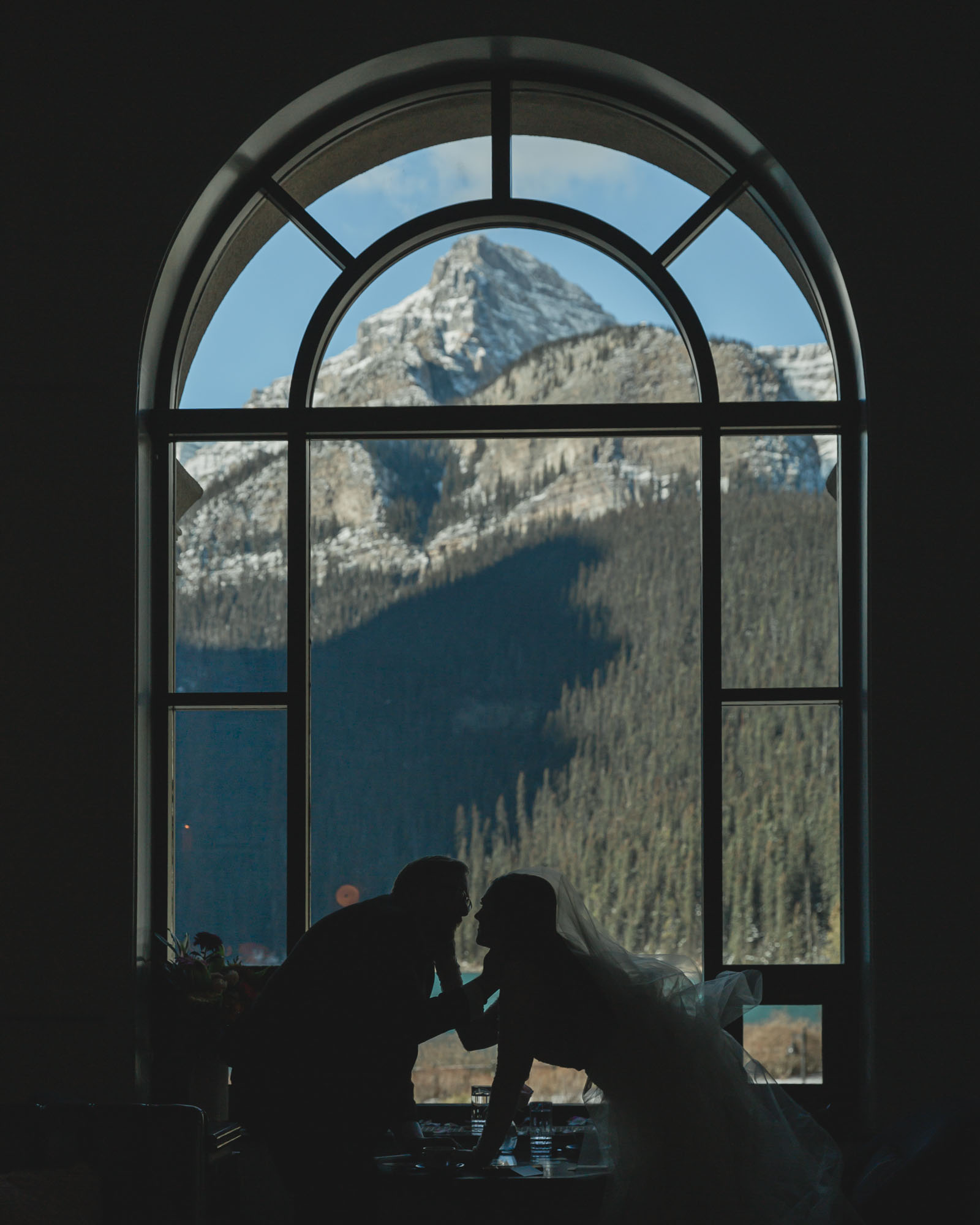Wedding portraits at brunch in the Fairview Bar and Restaurant at the Chateau Lake Louise