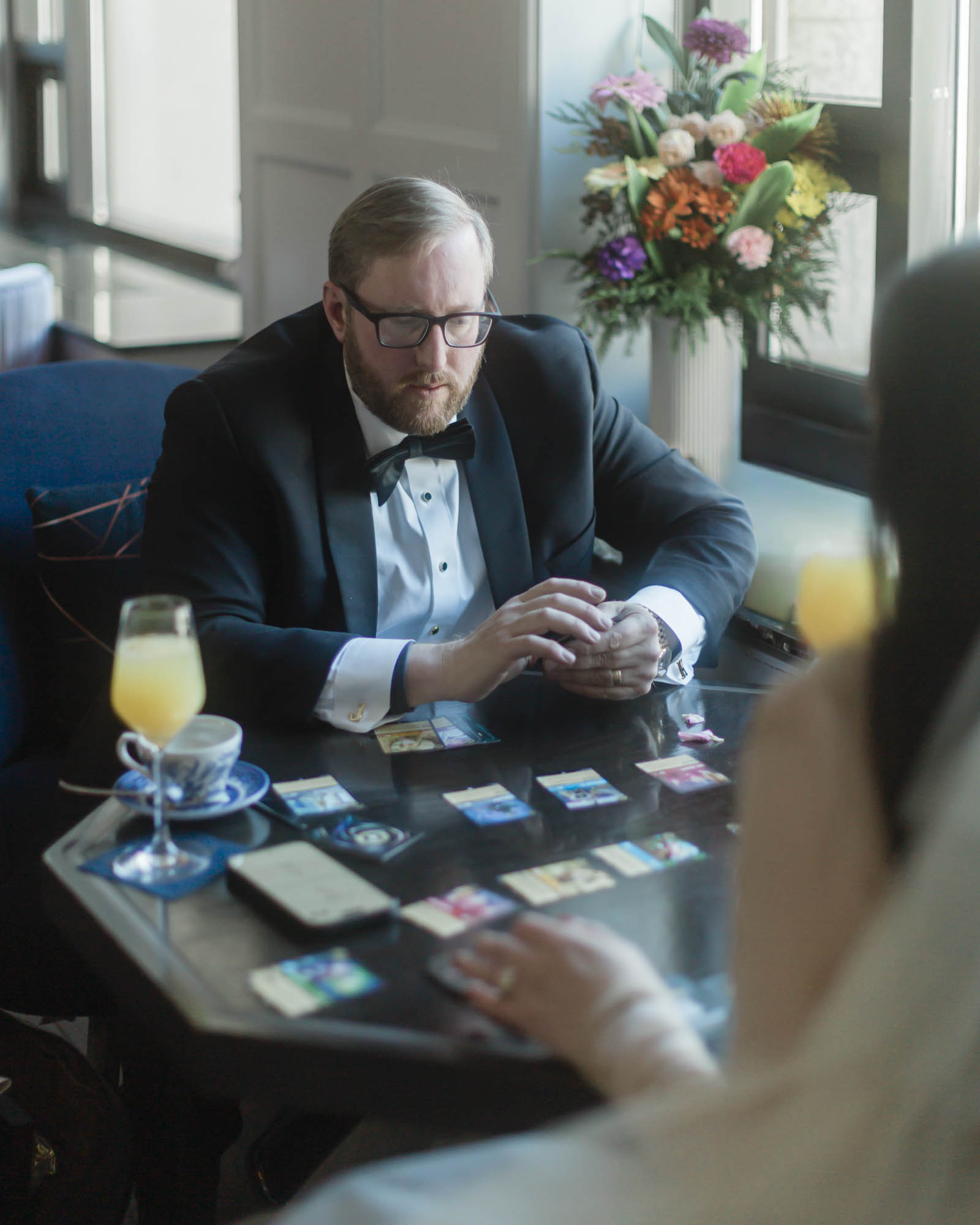Playing Lorcana card game at brunch in the Fairview Bar and Restaurant at the Chateau Lake Louise