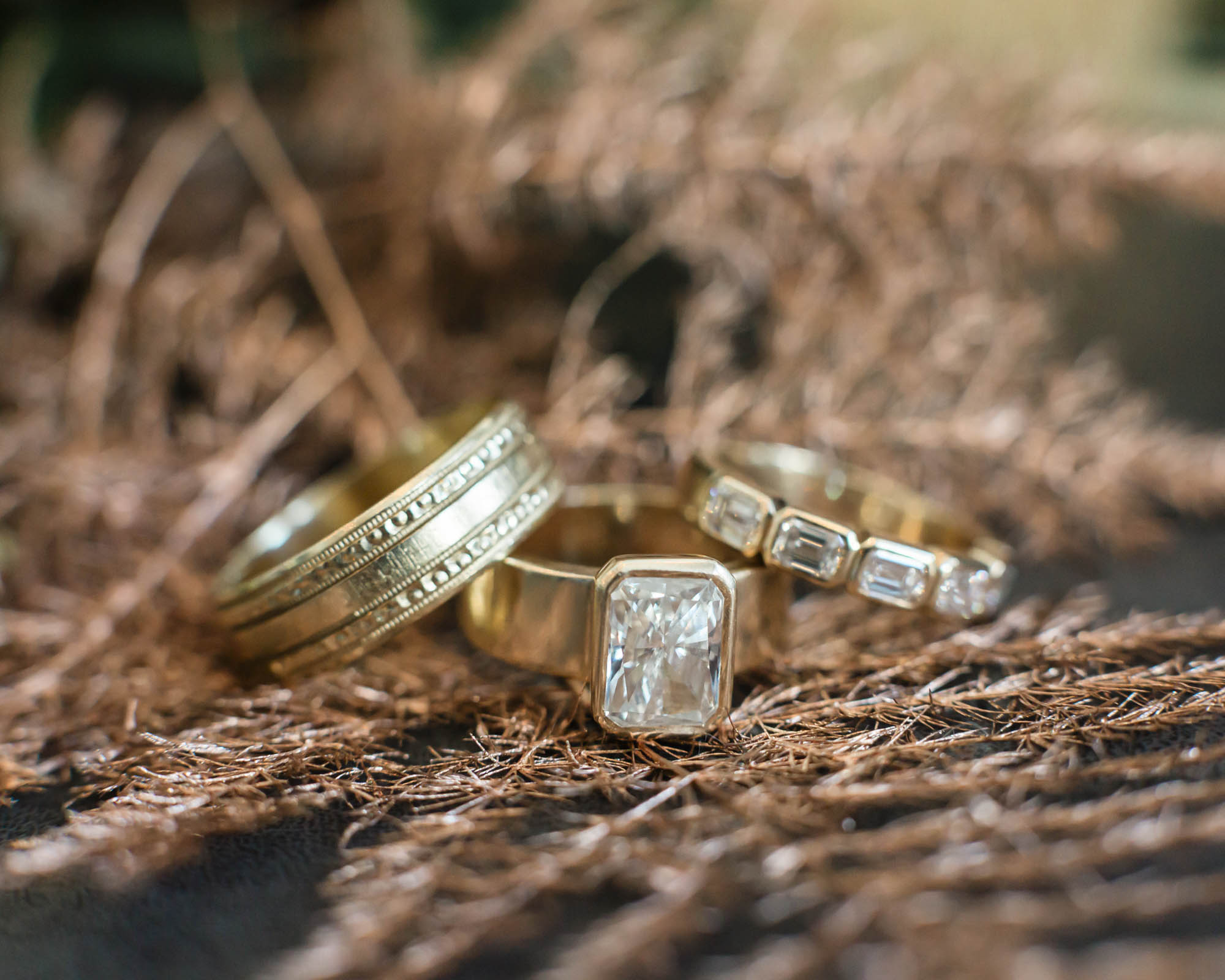 Wedding rings and florals featured together for an accessory and detail photo
