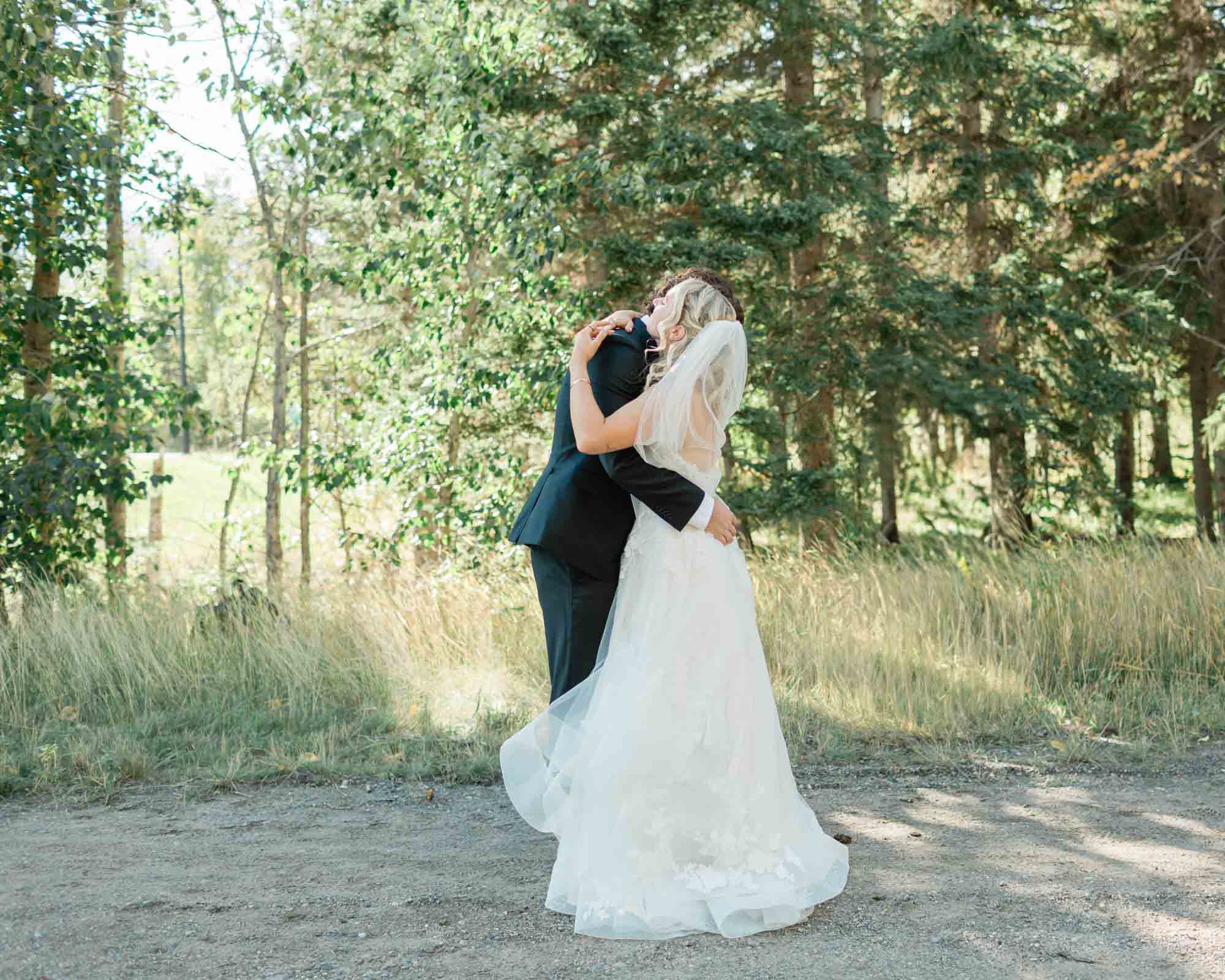 sarah and tyler's first look at copperstone resort by the mountain near banff 