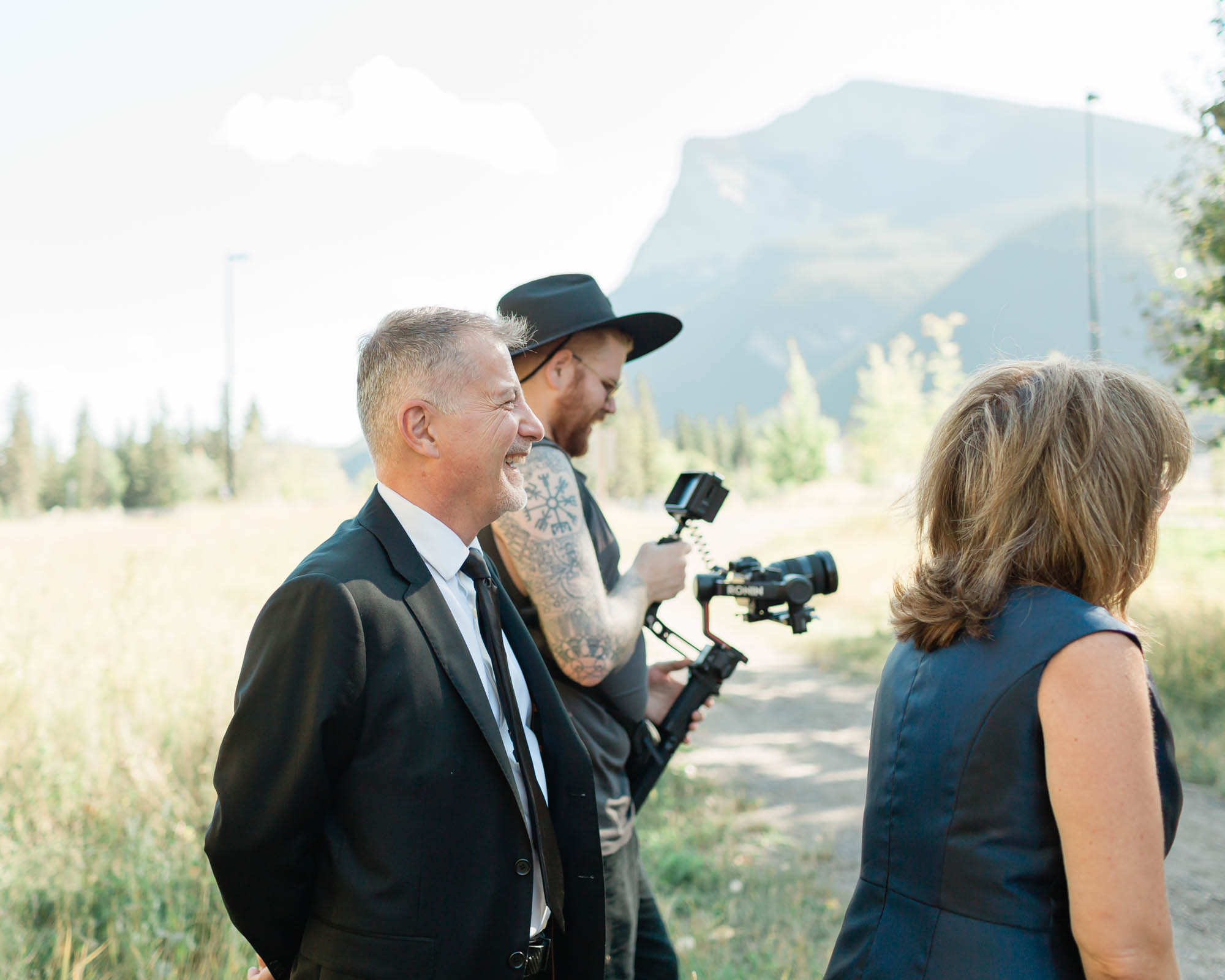 guests laughing and celebrating the happy couple