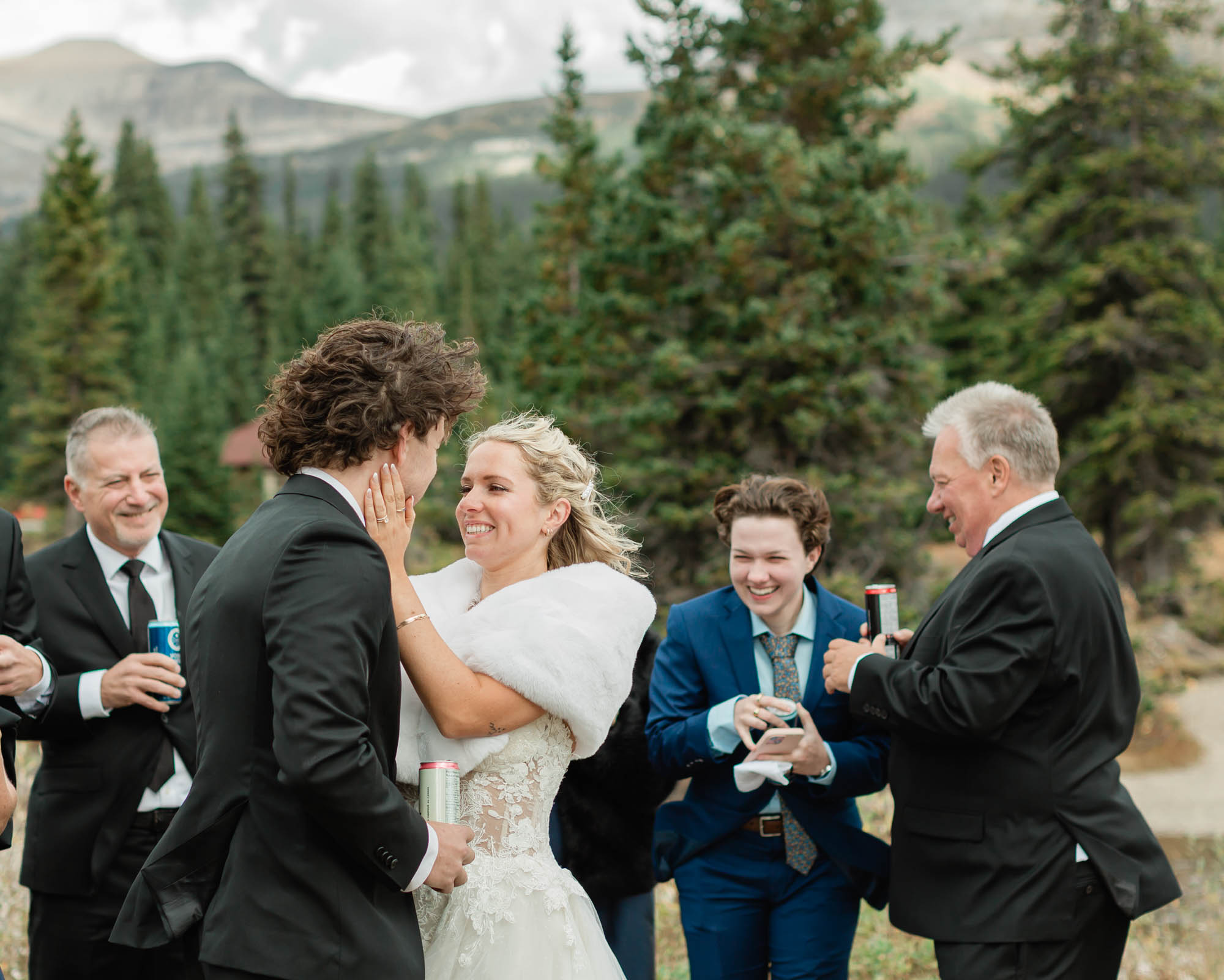sarah holding tyler's face in a loving embrace