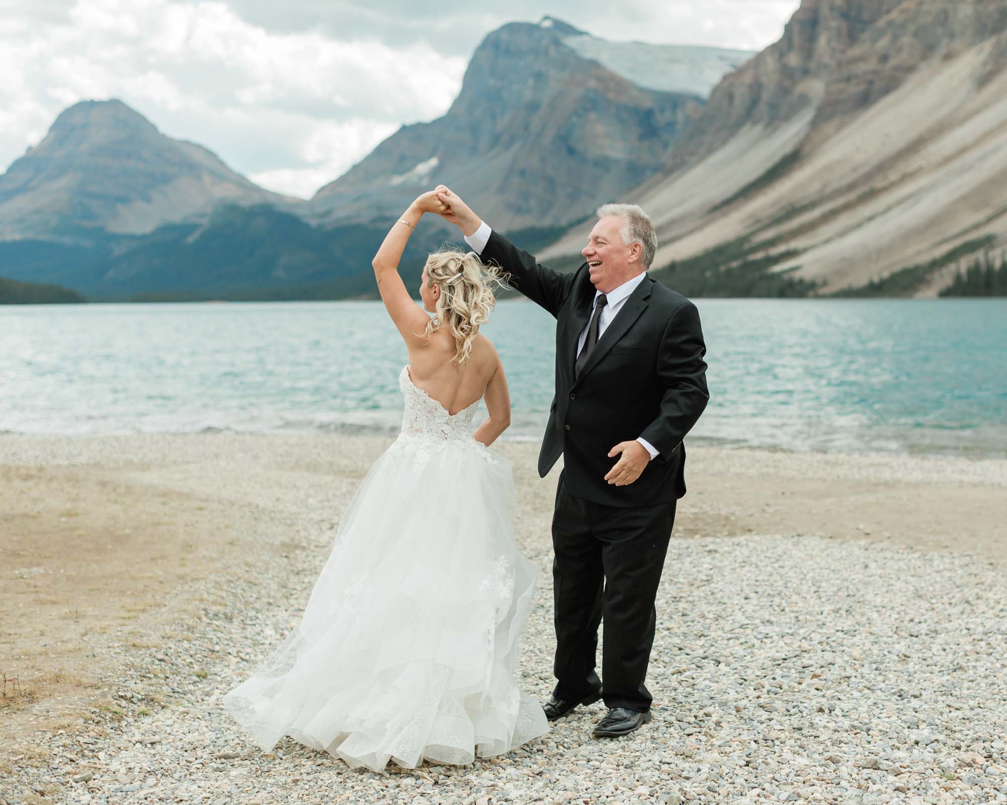 sarah and her dad having a father daughter first dance after her banff wedding
