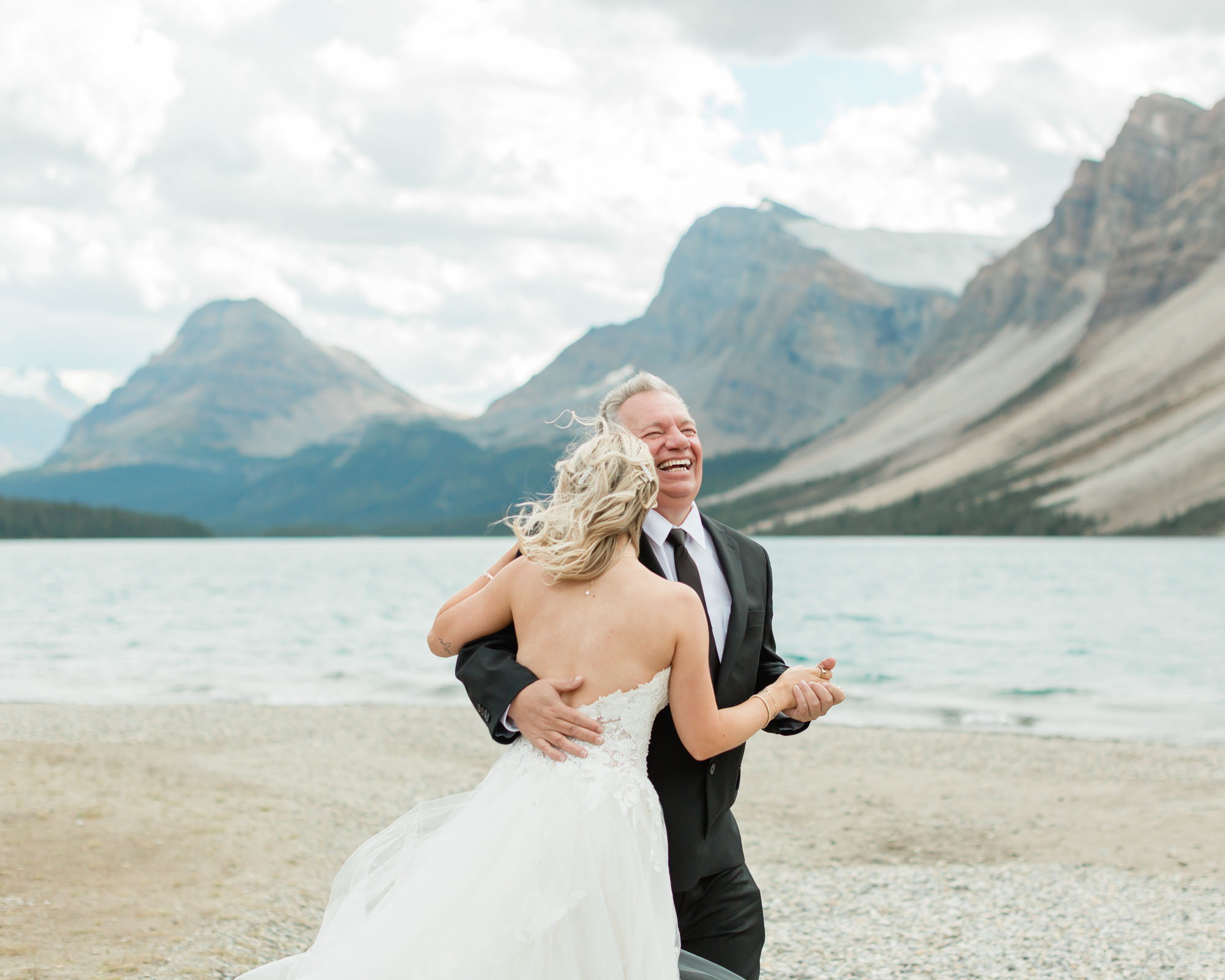 sarah and her dad having a father daughter first dance after her banff wedding