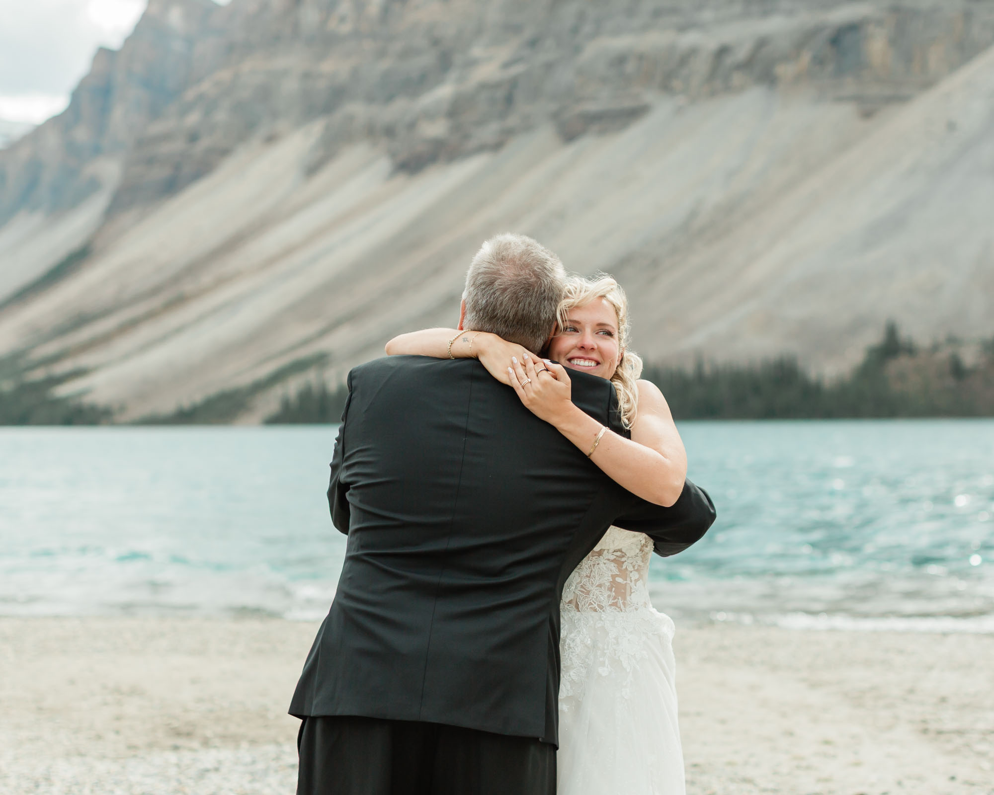 sarah and her dad having a father daughter first dance after her banff wedding