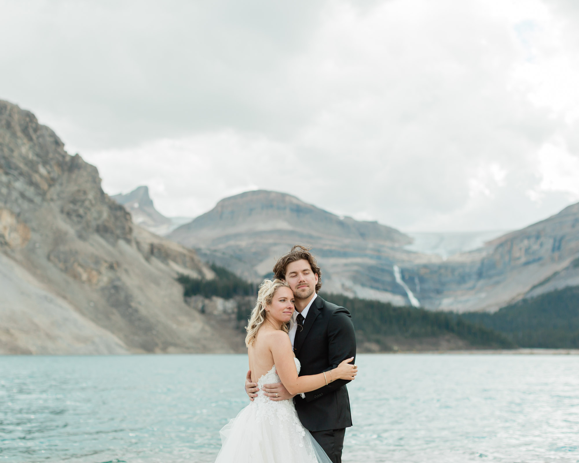 sarah and tyler looking off at the mountain views