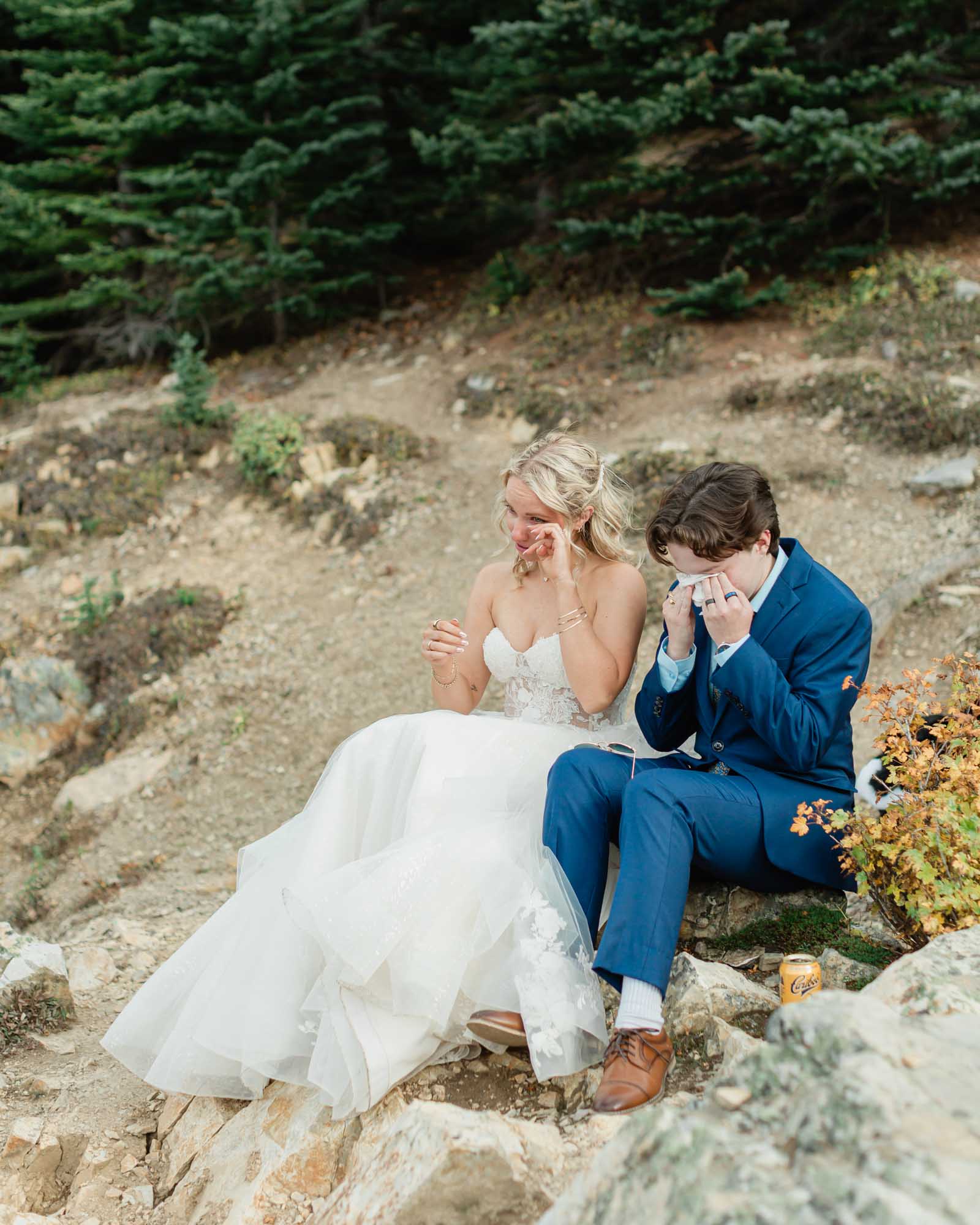 Sarah and her sister sharing heartfelt tears together while admiring the peyto lake view for her summer banff elopement