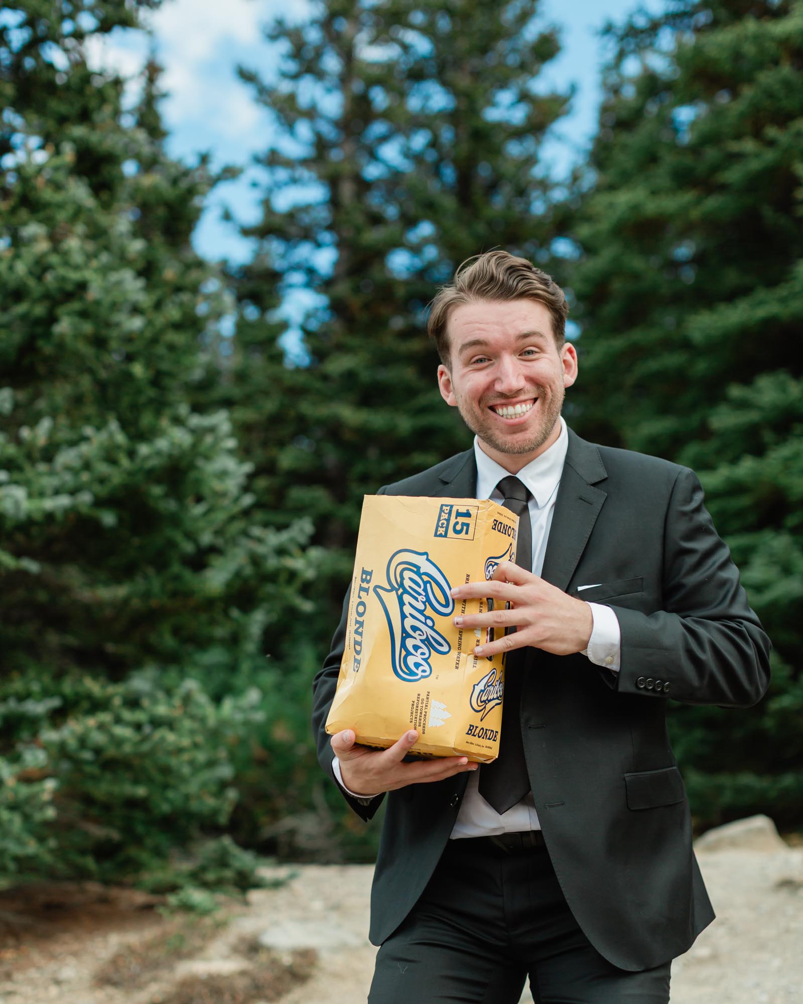 brother holding beer