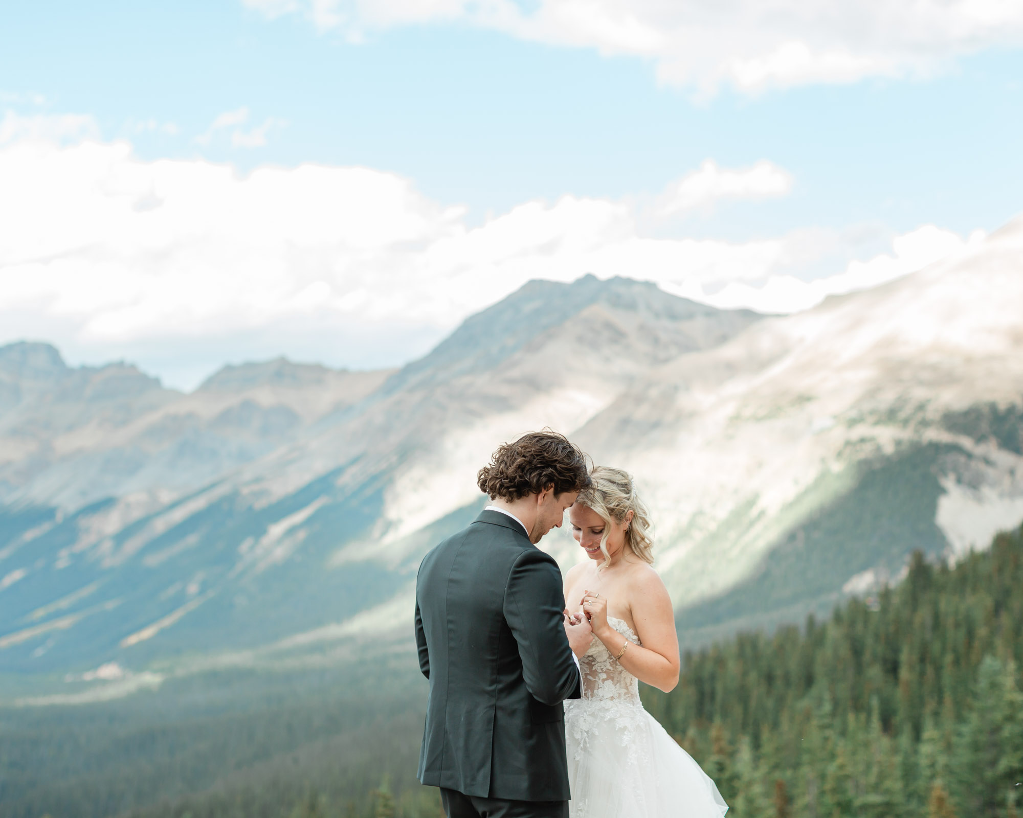 couple embracing after their summer banff wedding 
