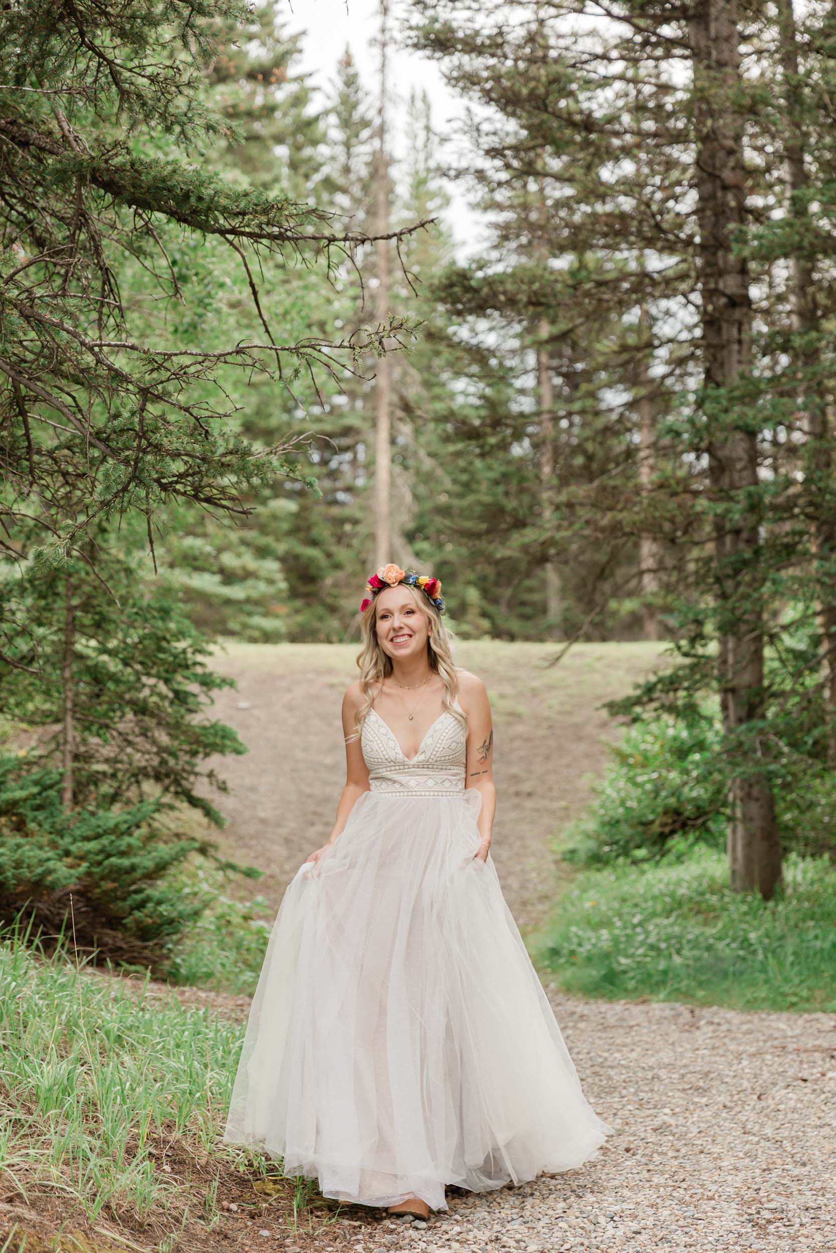 Megan walking towards Scott for their mountain first look