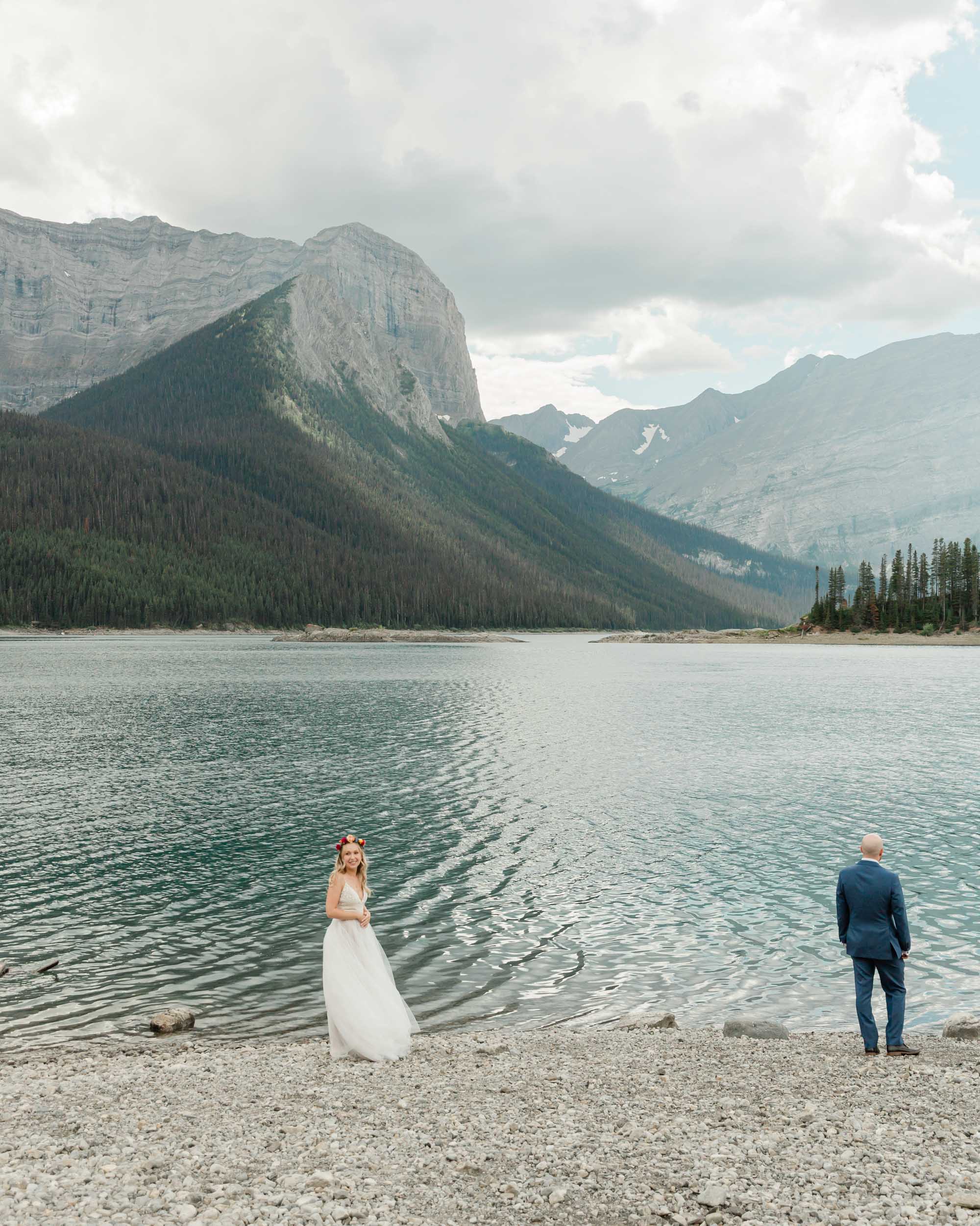 megan preparing for the first look before their kananaskis mountain elopement ceremony 