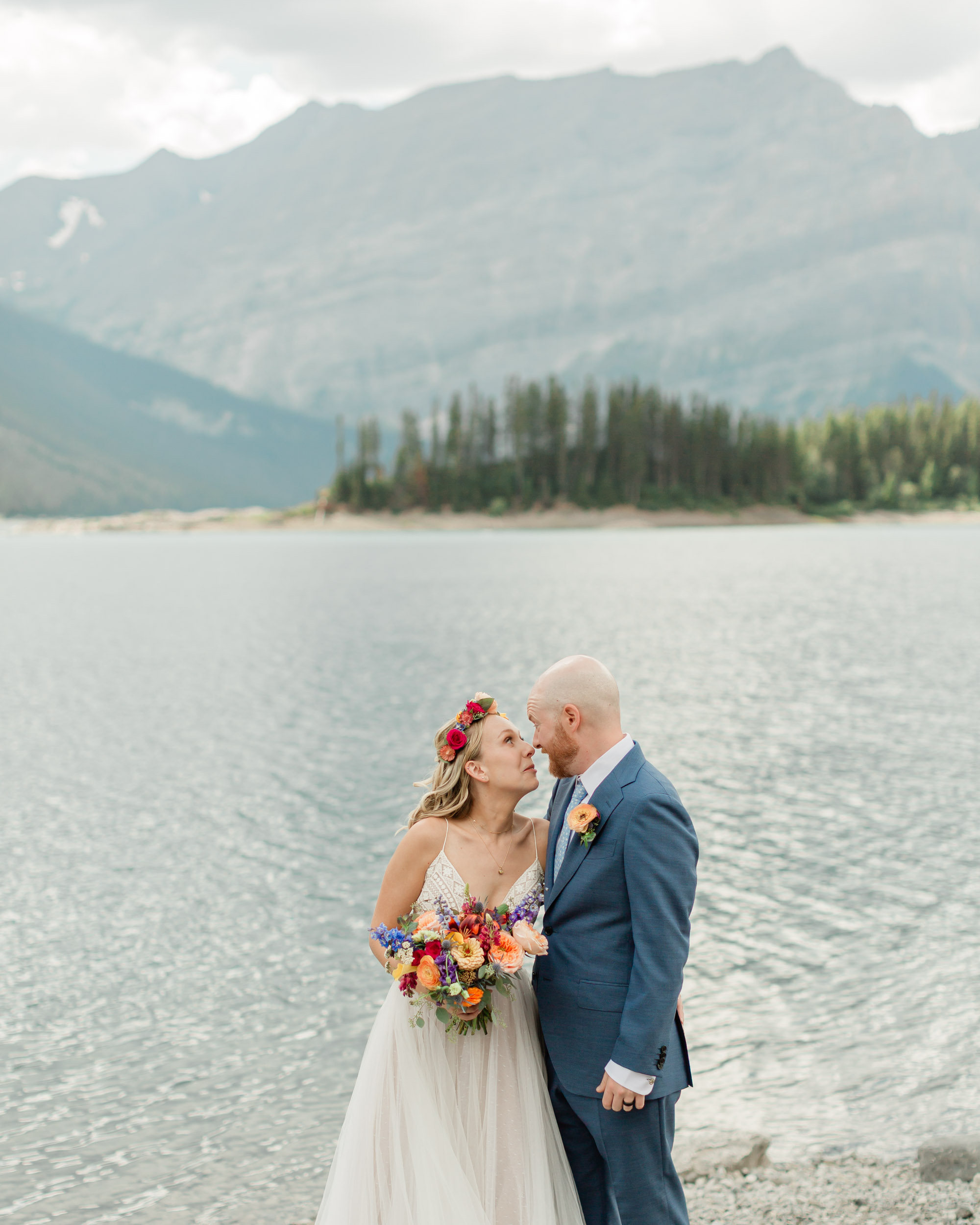 couples portraits before the ceremony during their kananaskis mountain elopement day