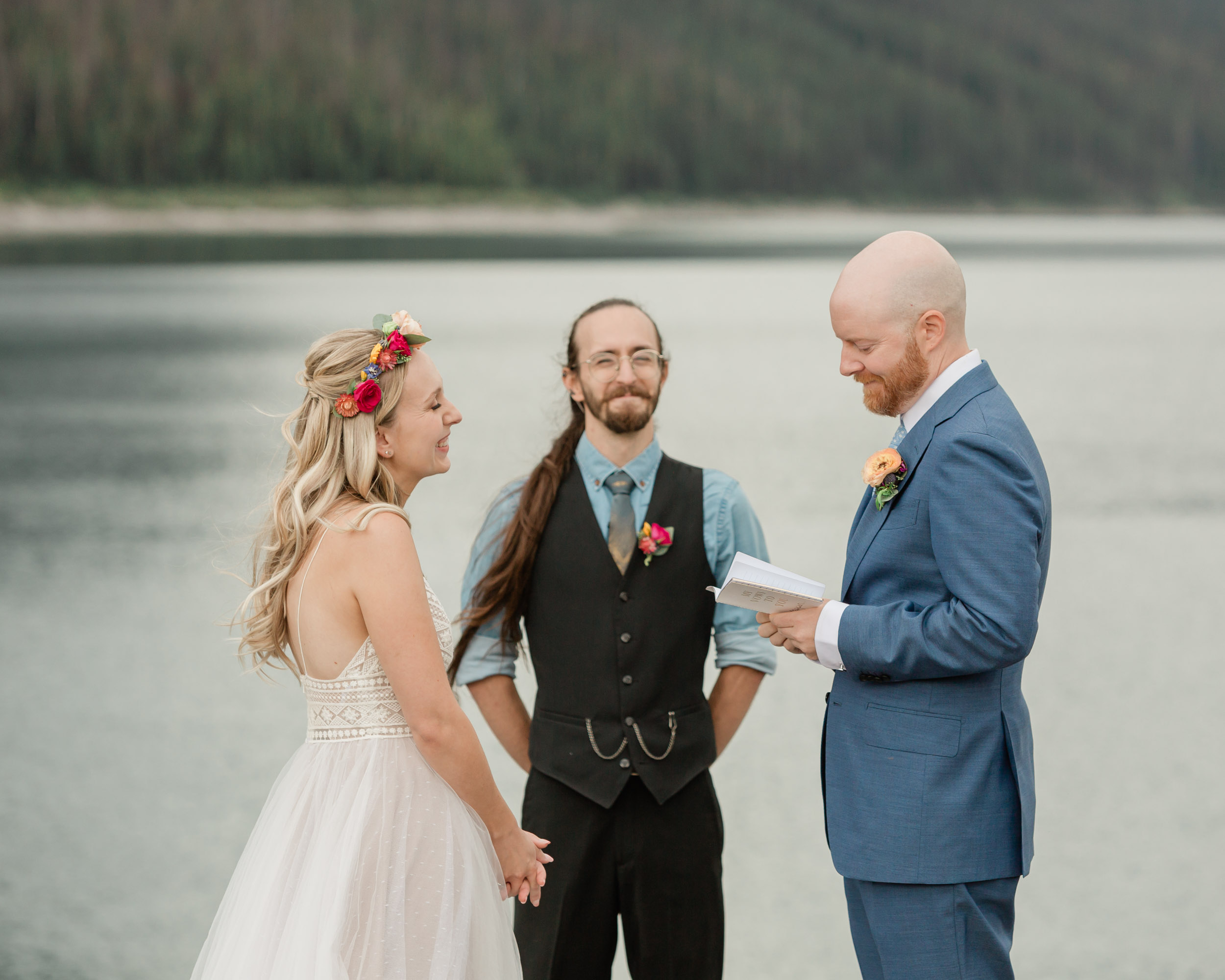 the couple reciting their vows for their kananaskis mountain elopement