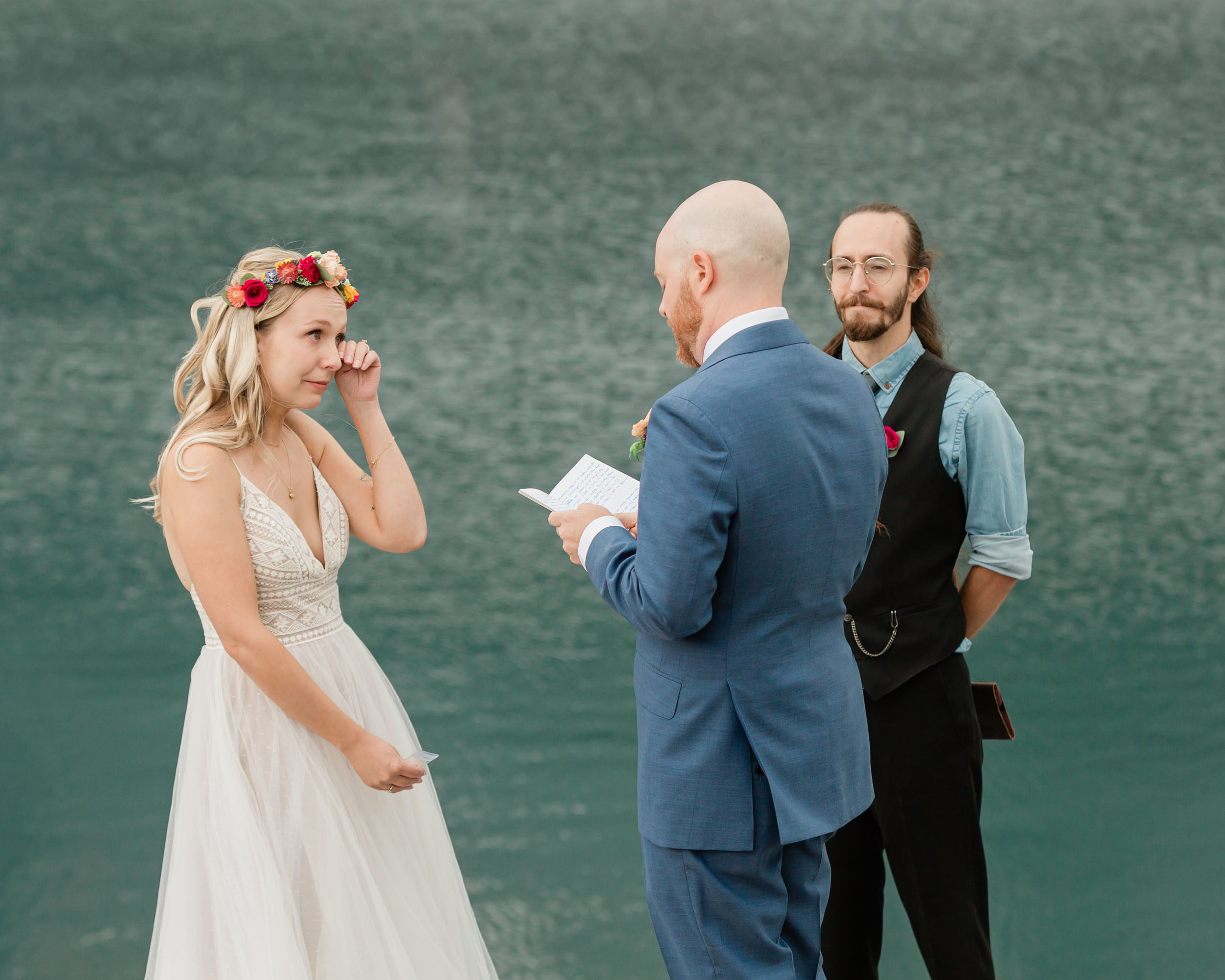 the couple reciting their vows for their kananaskis mountain elopement