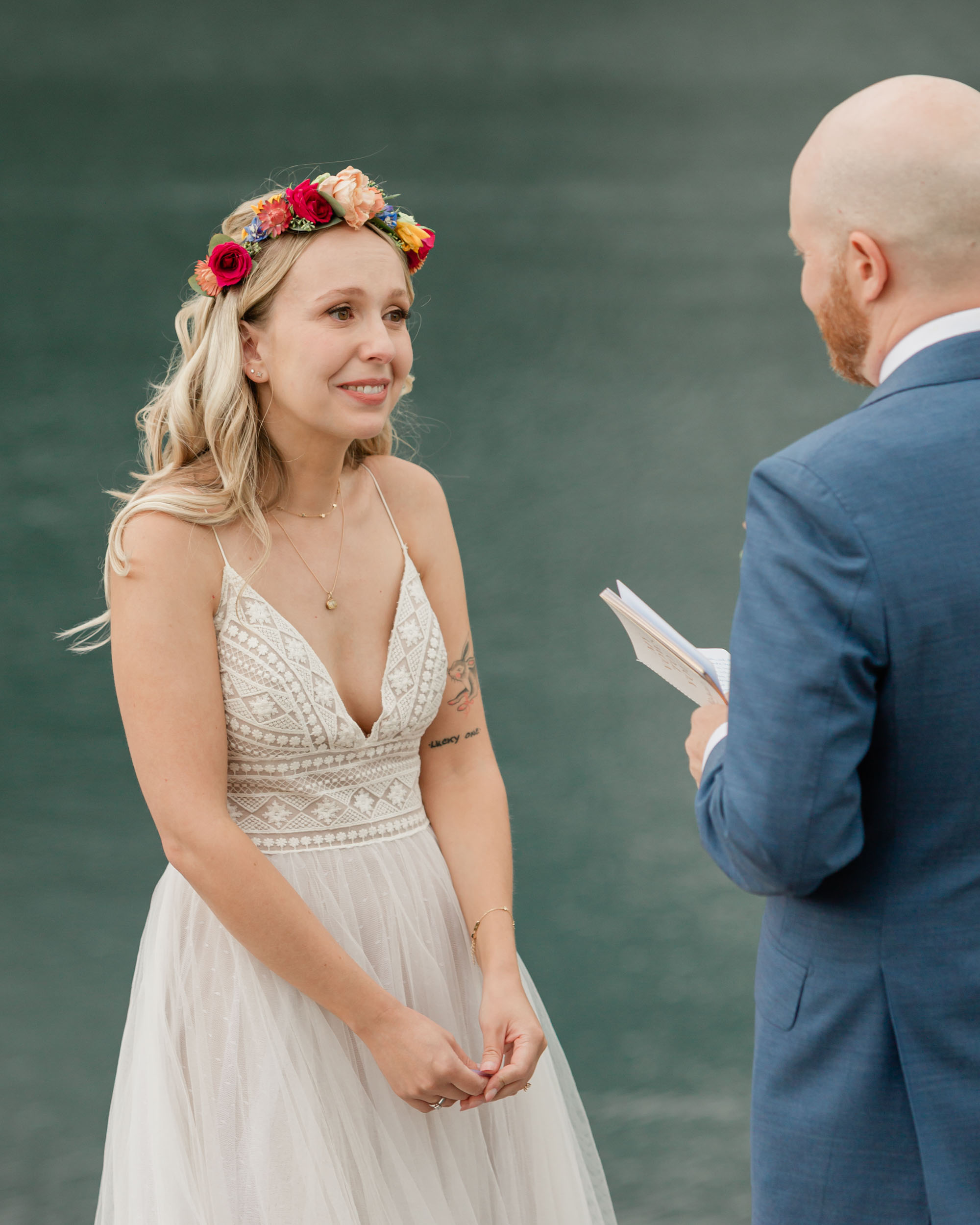 the couple reciting their vows for their kananaskis mountain elopement